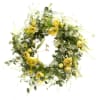 Yellow roses and white daisies arranged in a circular wreath