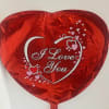Red heart-shaped foil balloon with "I Love You" text