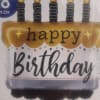 Birthday cake-shaped balloon with five candles and "happy birthday" text