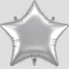Silver star-shaped foil balloon on a plain background