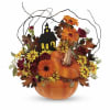 This hauntingly cute arrangement brings the Halloween spirit to life with a