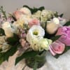 Pink and white mixed bouquet in a glass vase
