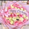 Pink and cream rose bouquet with a Happy Birthday ribbon