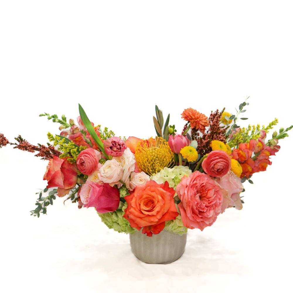 Colorful mixed bouquet in a gray vase