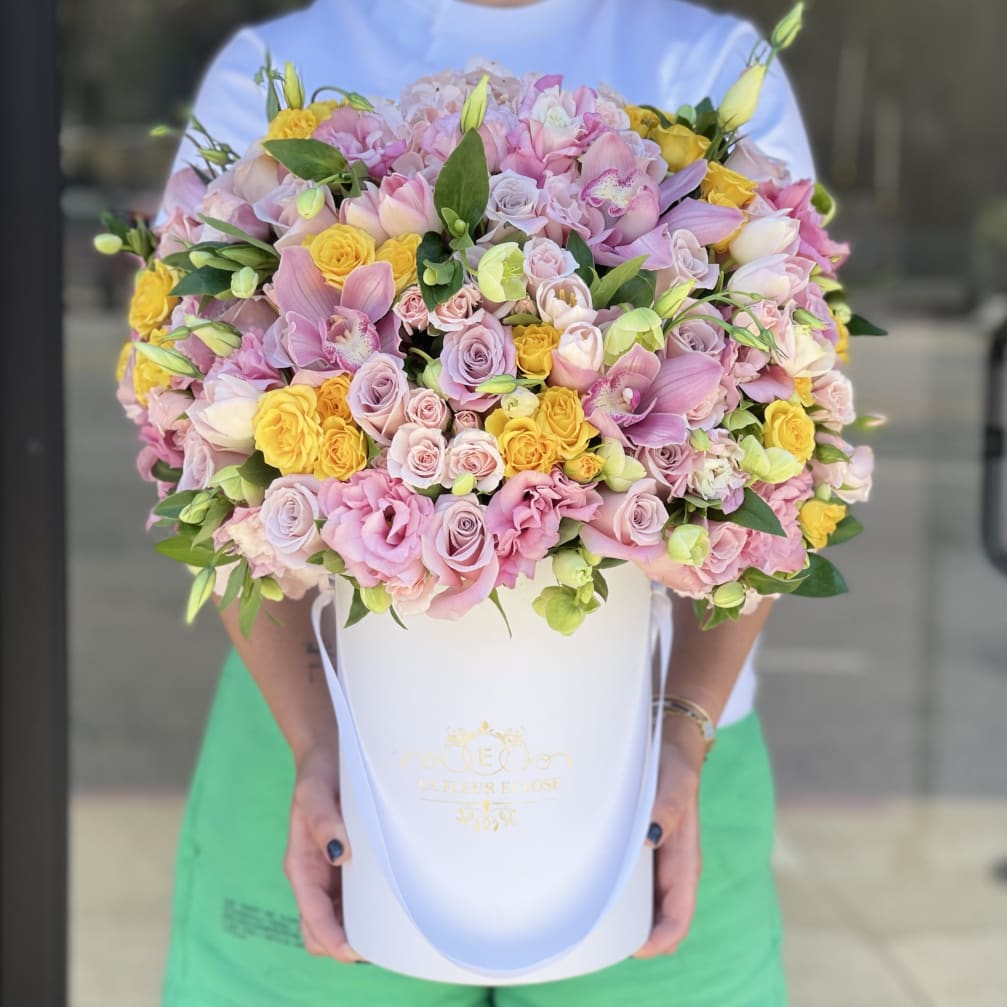 Large pastel bouquet in a white hatbox