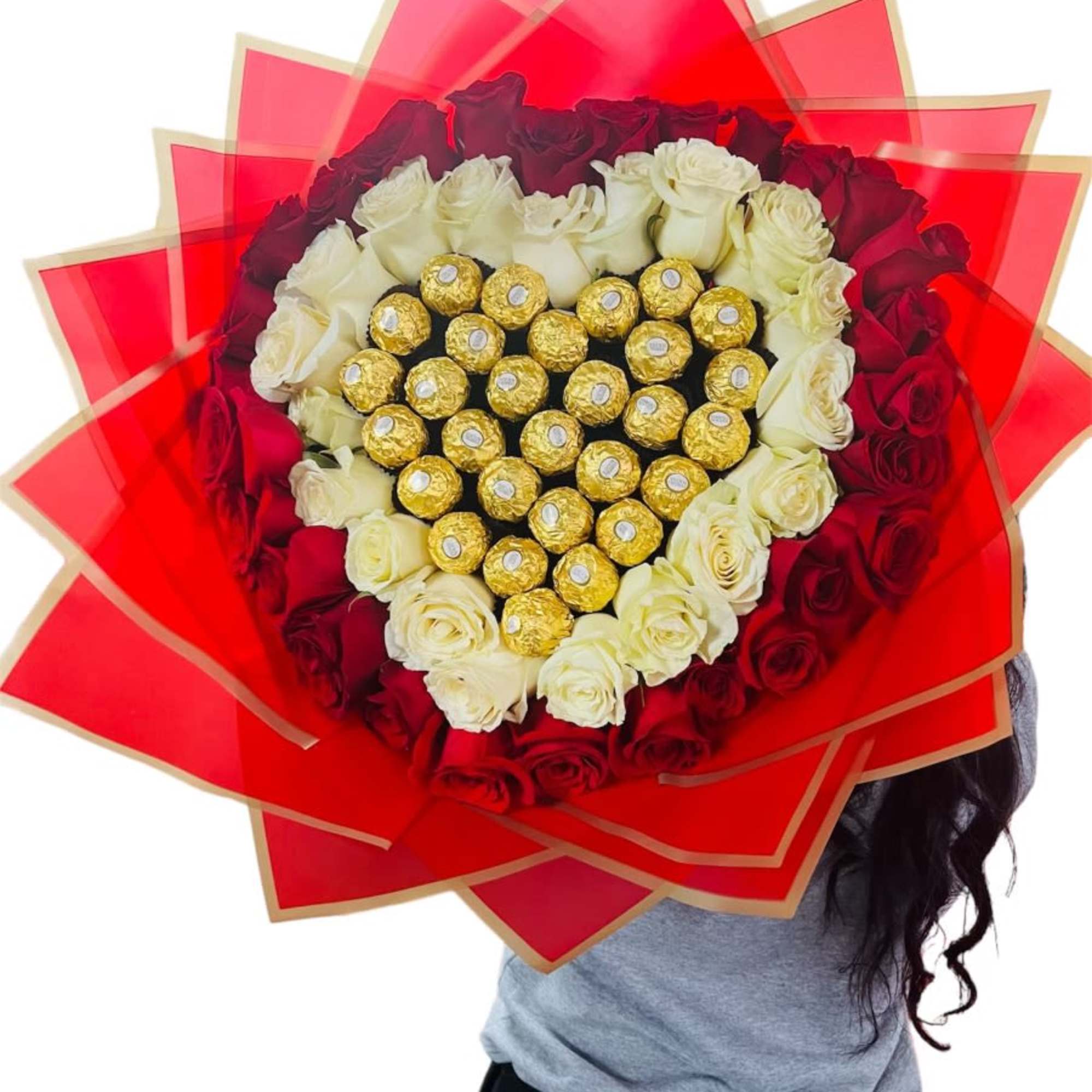 Heart-shaped bouquet of red and white roses with gold chocolates in red wrap