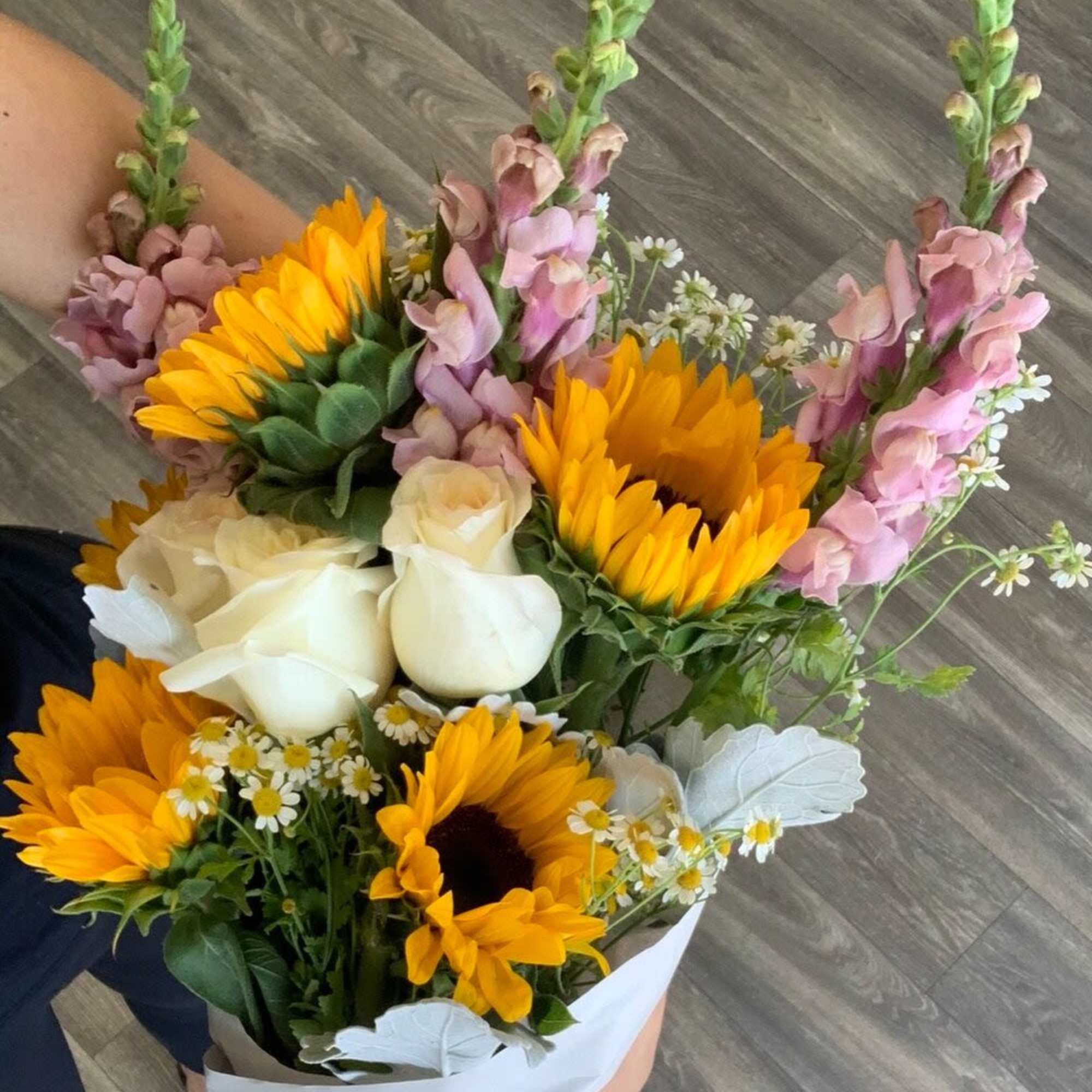 Bouquet with sunflowers, white roses, and pink snapdragons