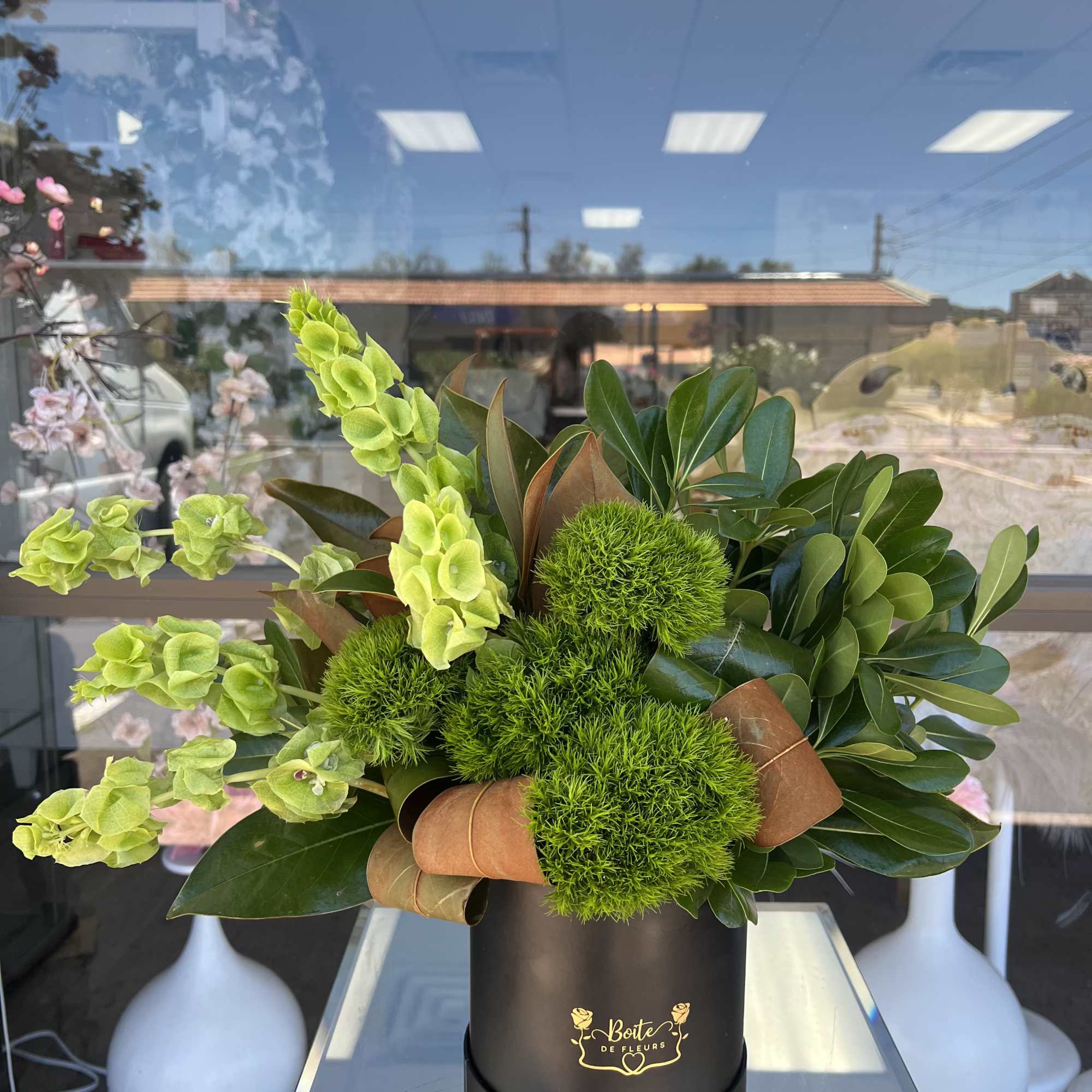 Green Garden is a lush foliage arrangement featuring premium greenery and textured