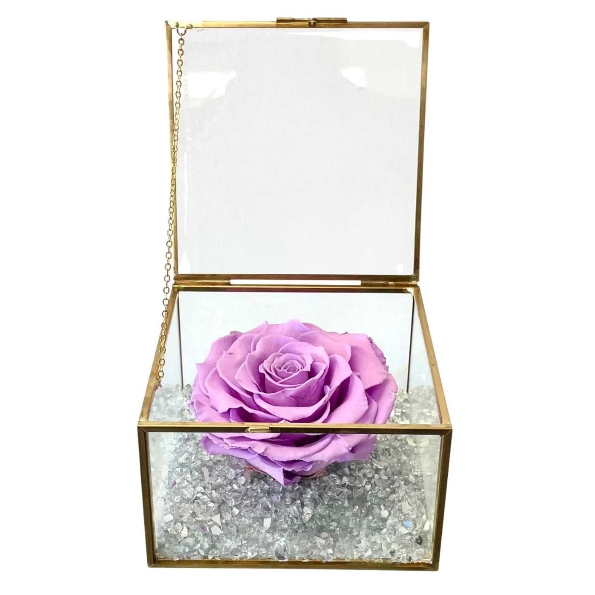 Purple rose in a gold glass box with clear crystals