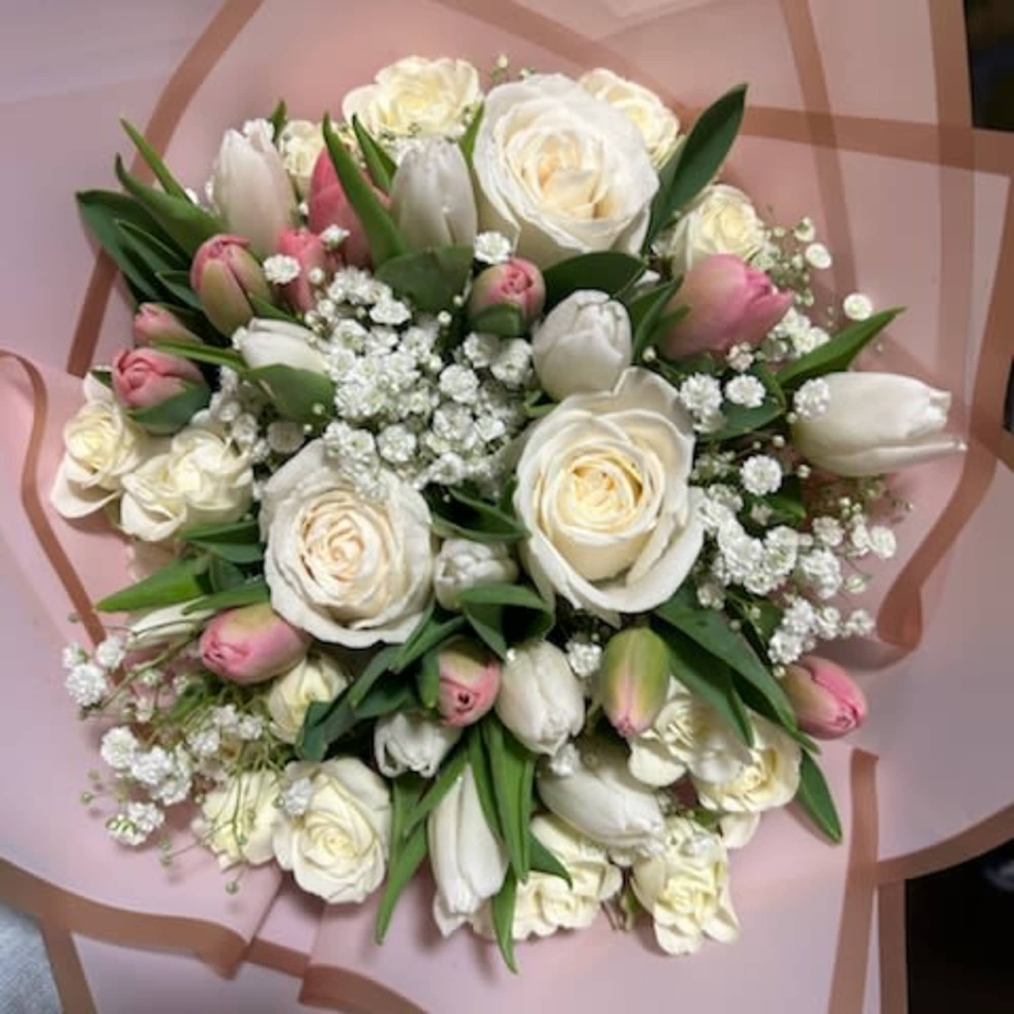 Boquet of white (regular and mini) roses, white tulips, pink tulips, and