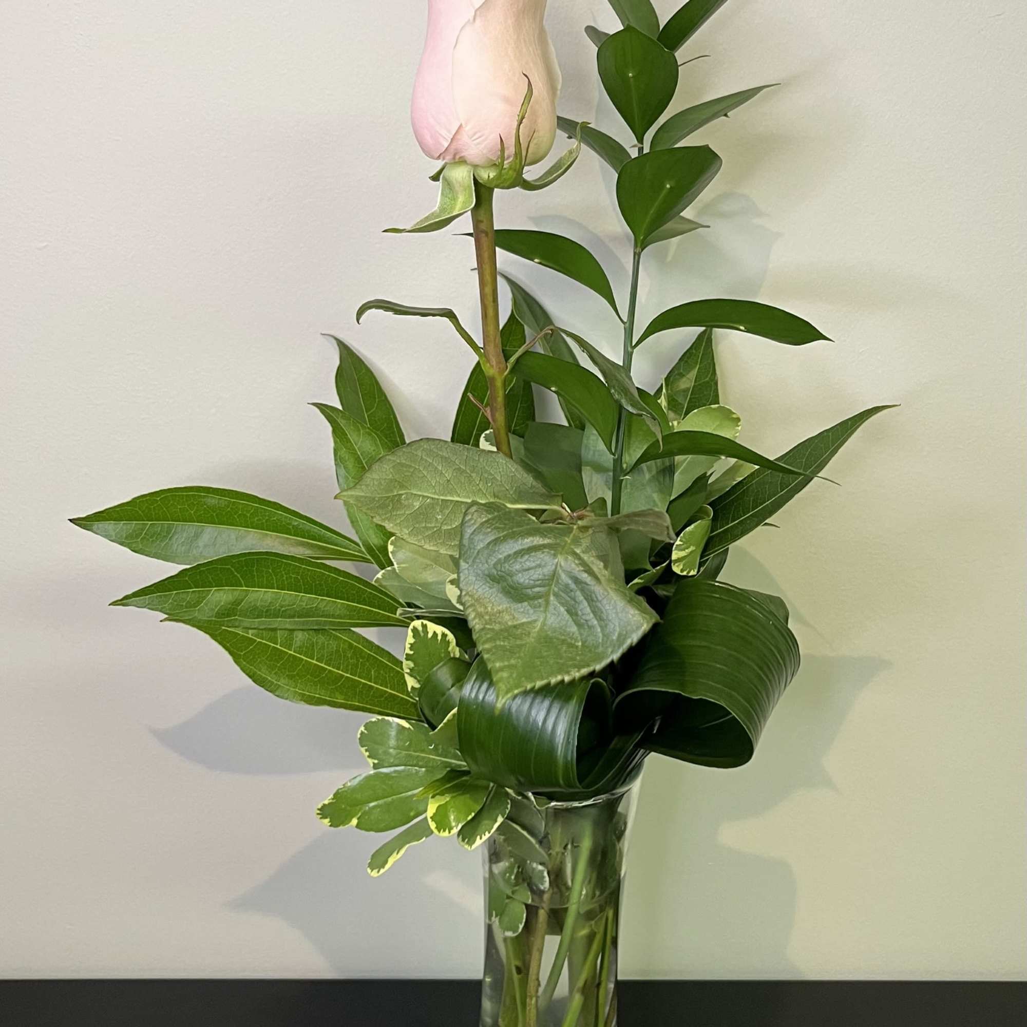 A simple declaration of love with a bud vase of a pink
