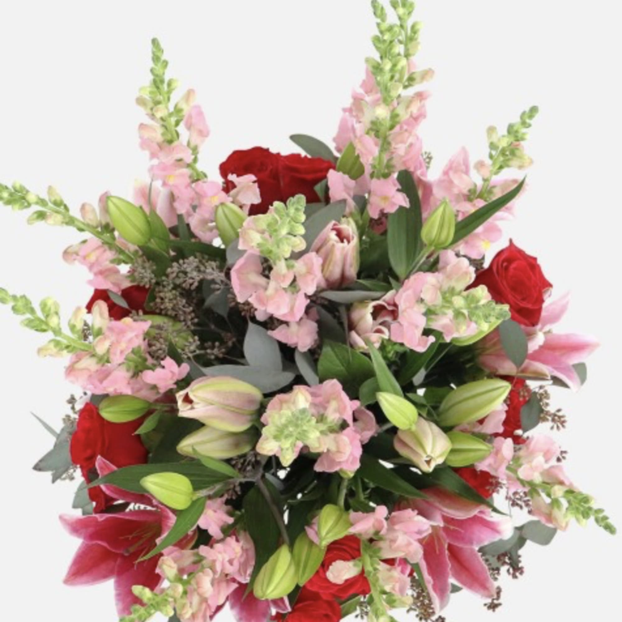 Bouquet of red roses, pink lilies, and pale pink snapdragons