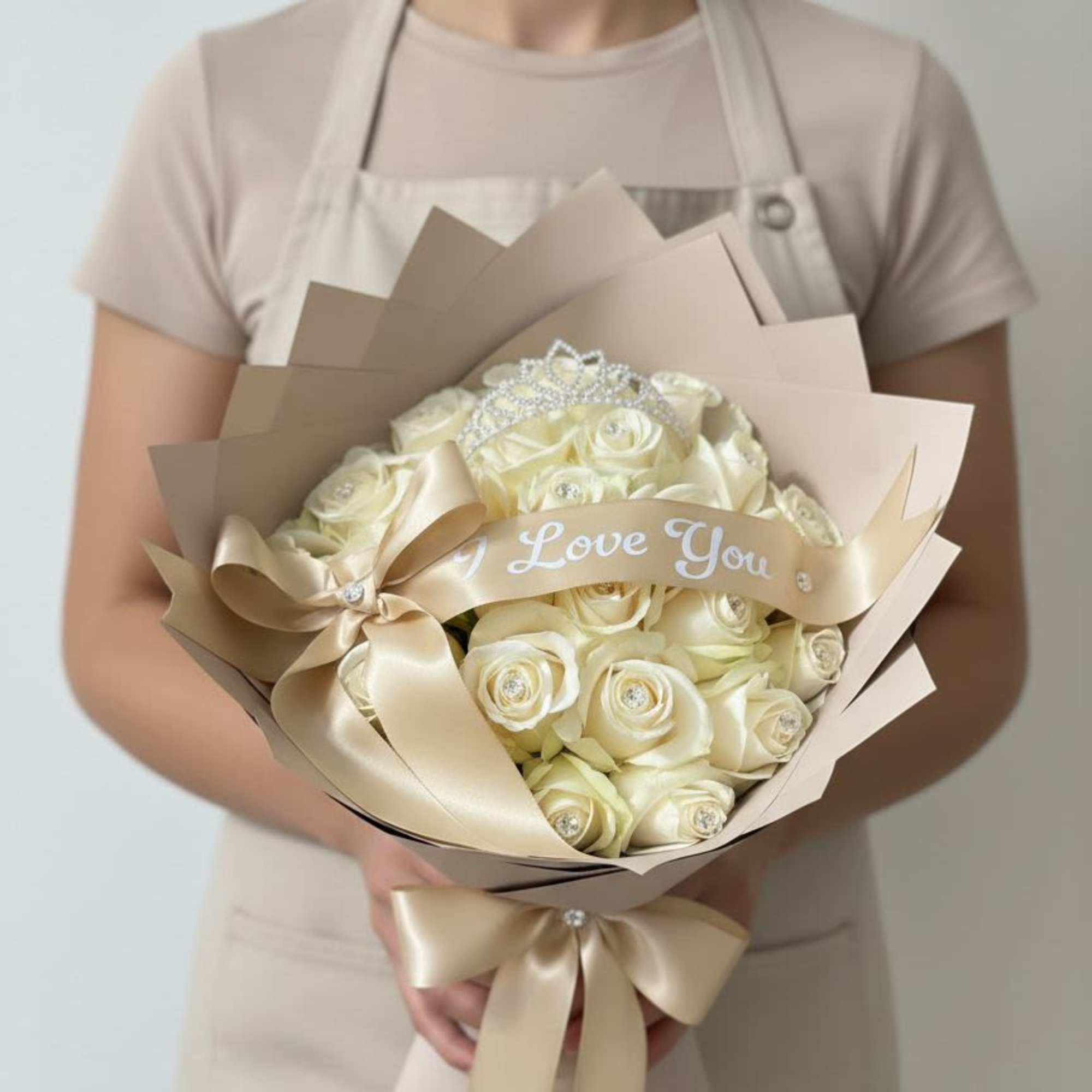 Cream rose bouquet with a satin ribbon and "Love You" banner