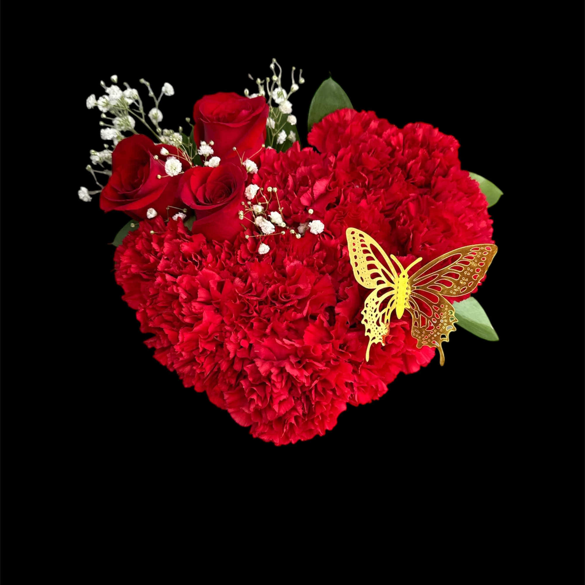 Red rose and carnation arrangement with baby's breath and a butterfly accent