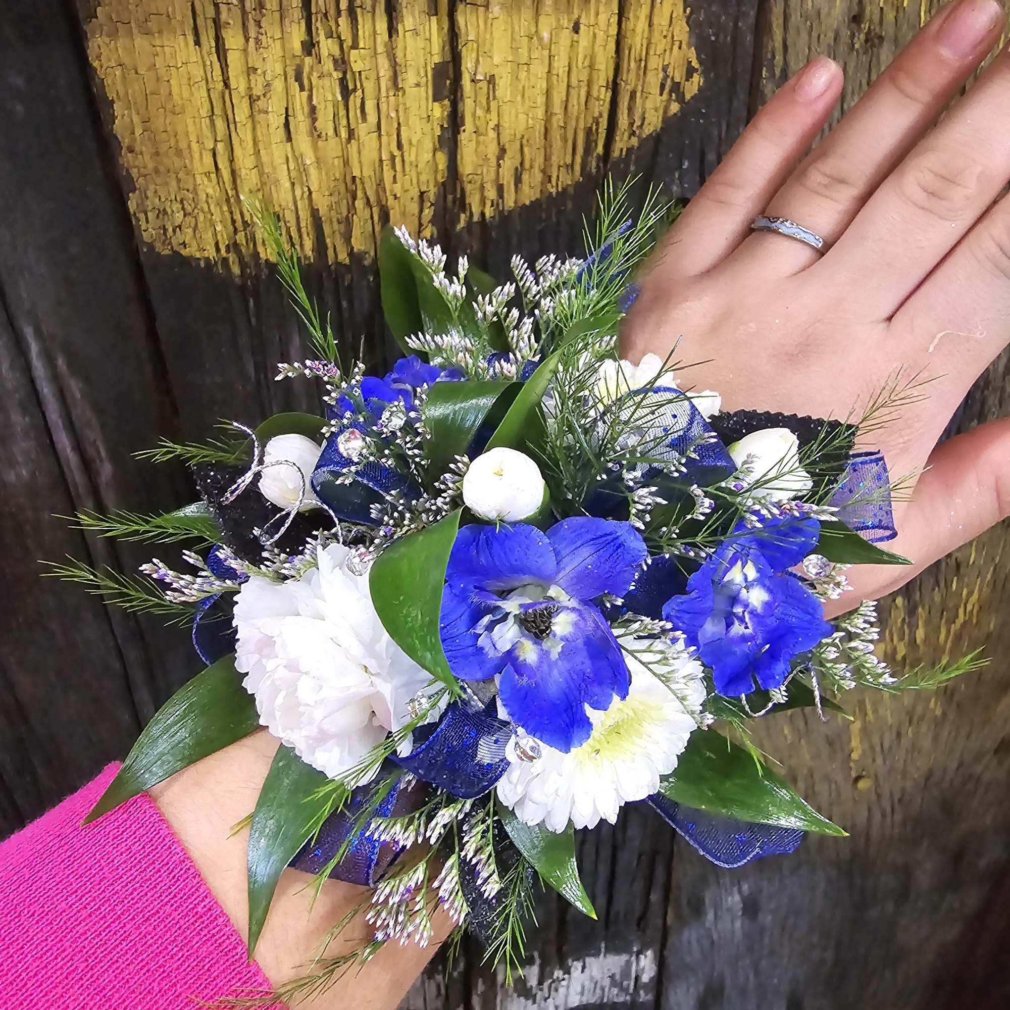 A beautiful corsage with blue tones made with your choice of flowers., photo 2 of 4