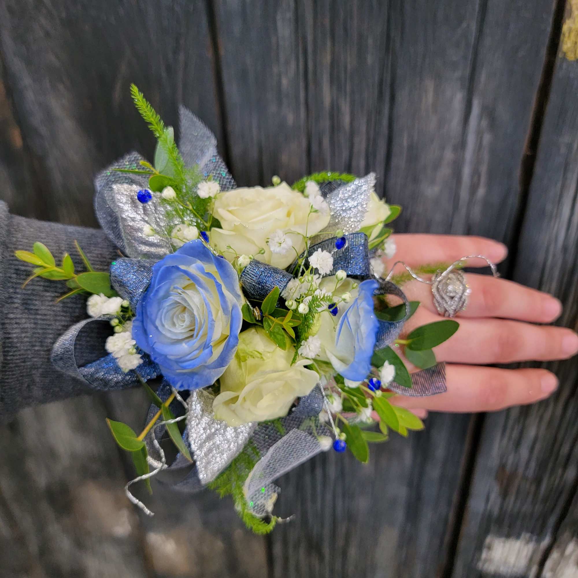 A beautiful corsage with blue tones made with your choice of flowers., photo 4 of 4