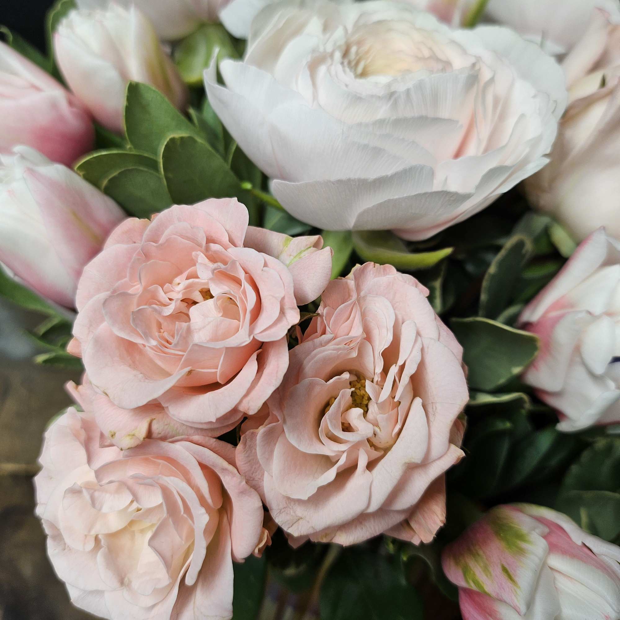 Bouquet of pale pink and white ranunculus flowers, photo 3 of 4