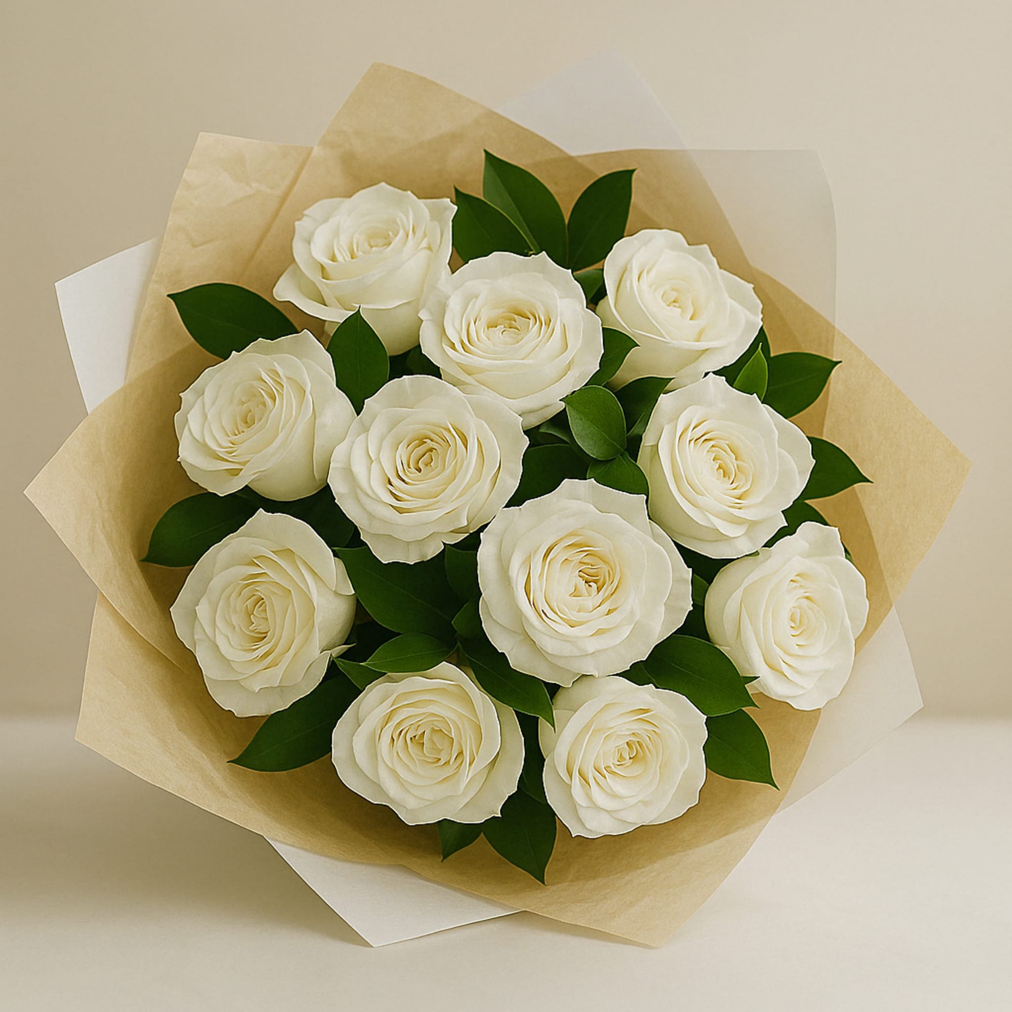 Bouquet of white roses wrapped in tan paper