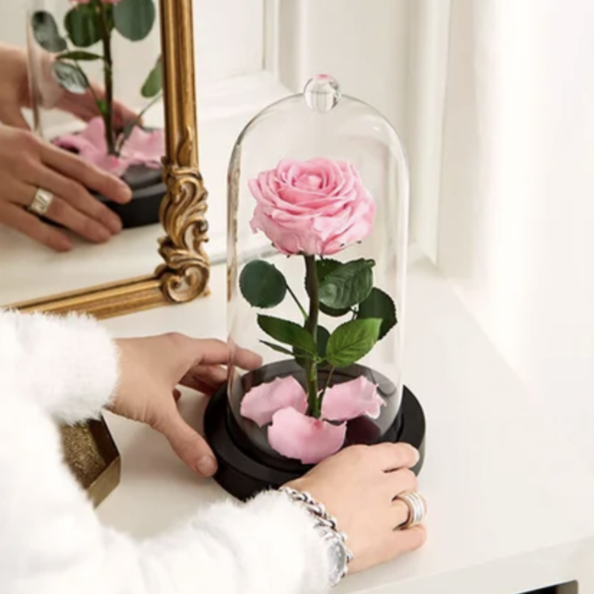 Pink rose under a glass dome on a black base, photo 2 of 2