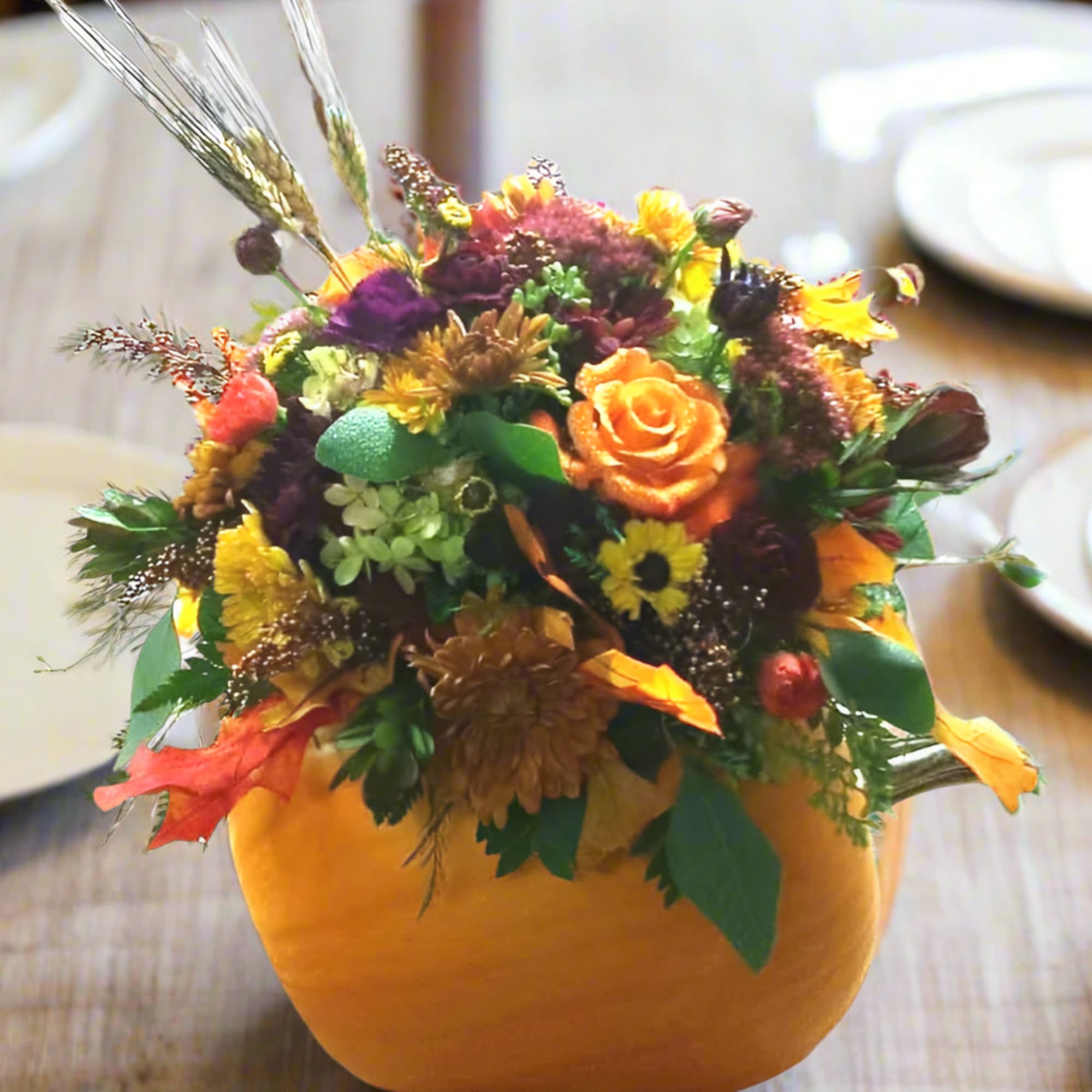 Elevate your autumn gatherings with our Pumpkin Patch Posies Centerpieces, a charming