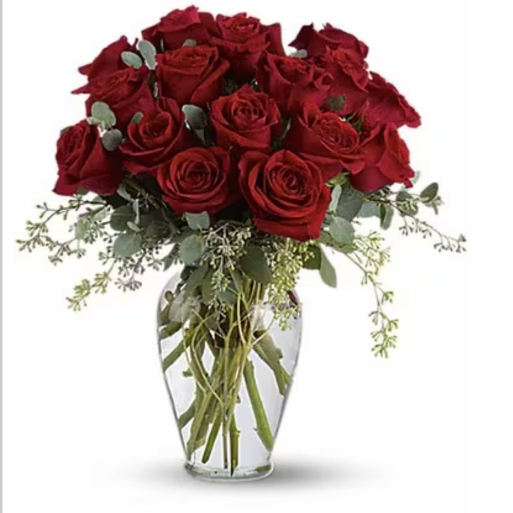 Bouquet of red roses in a clear glass vase