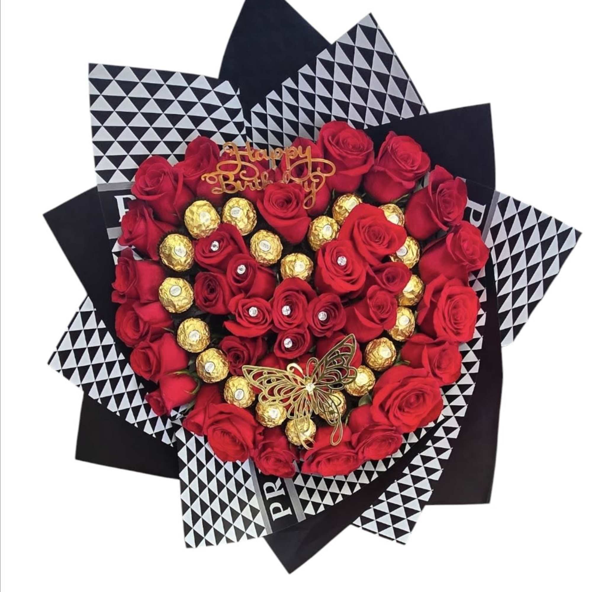 Heart-shaped bouquet of red roses with gold chocolates and a birthday topper