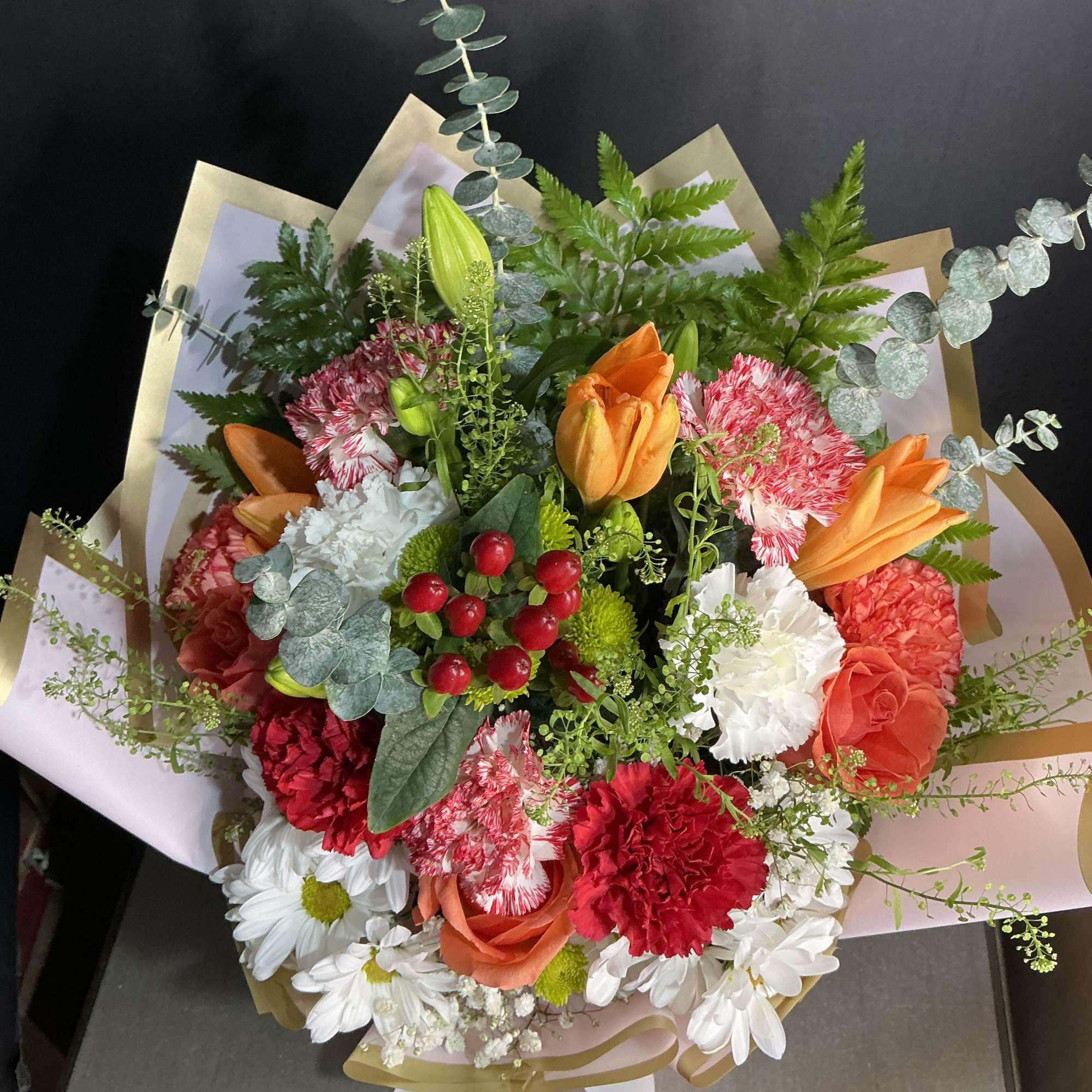 These arrangement it&rsquo;s ready for any special occasion 

Lilies, carnations, chisanthemums and, photo 2 of 2