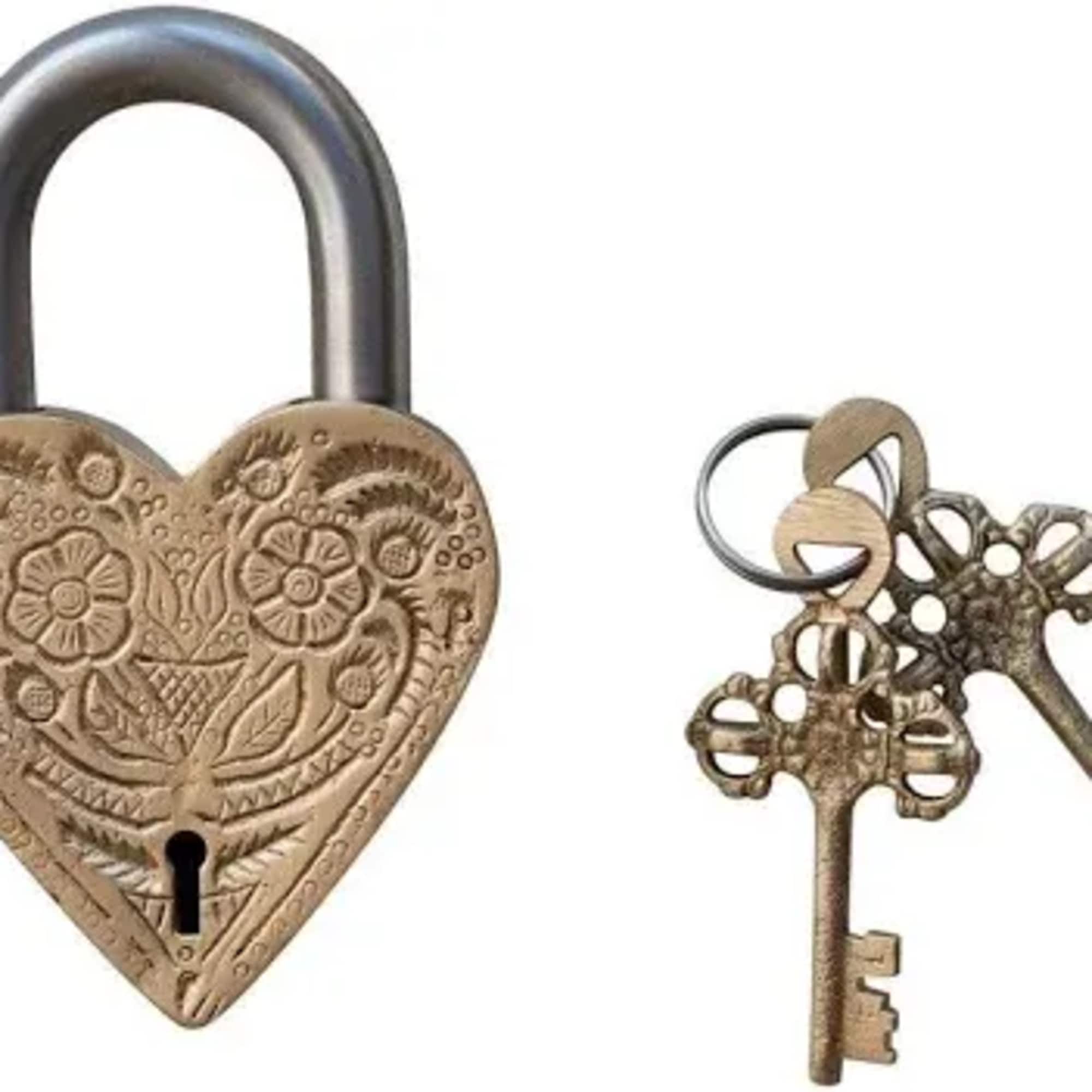 Decorative heart-shaped padlock with two ornate keys