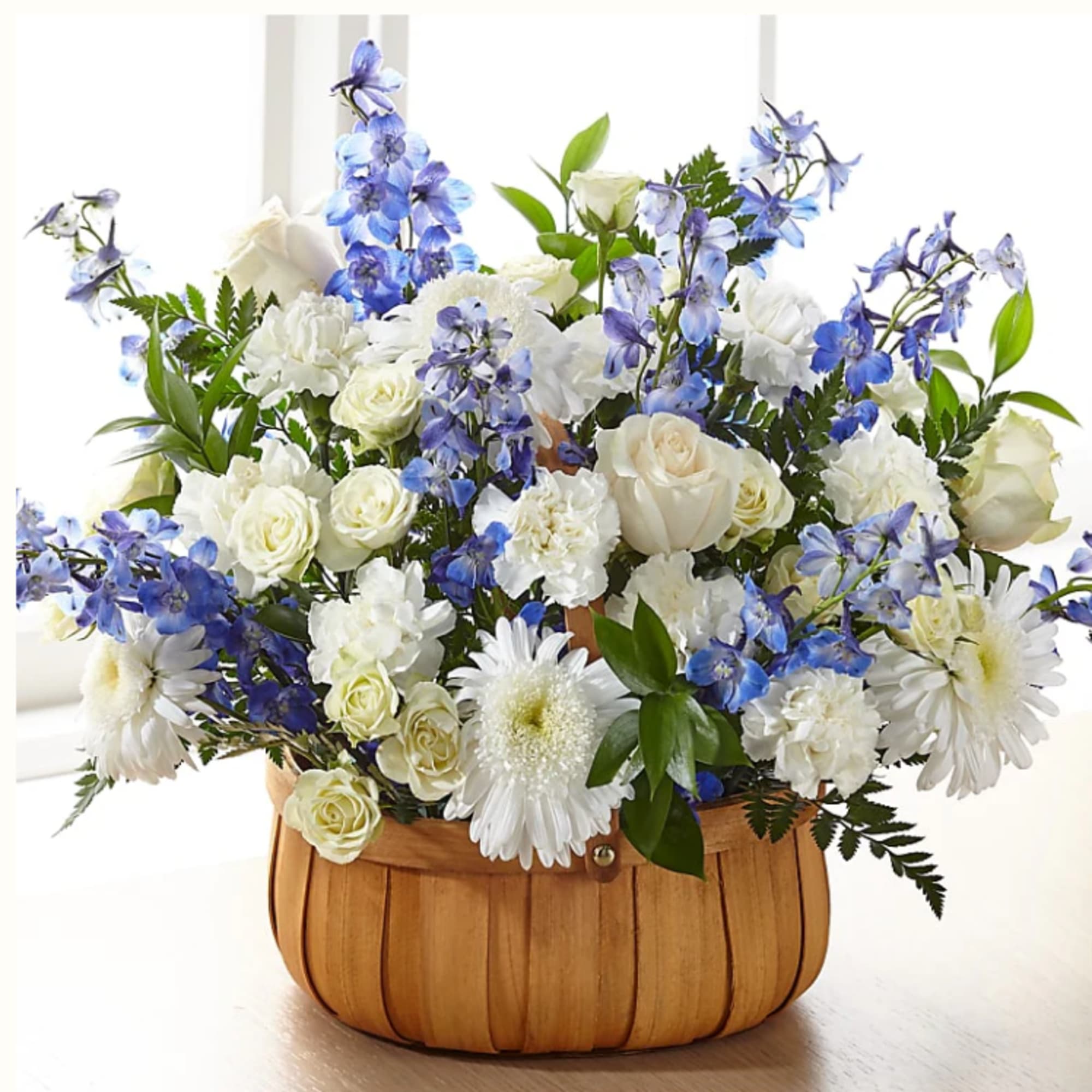 Crafted with a modern mix of blooms, our Harmony &amp; Grace Basket