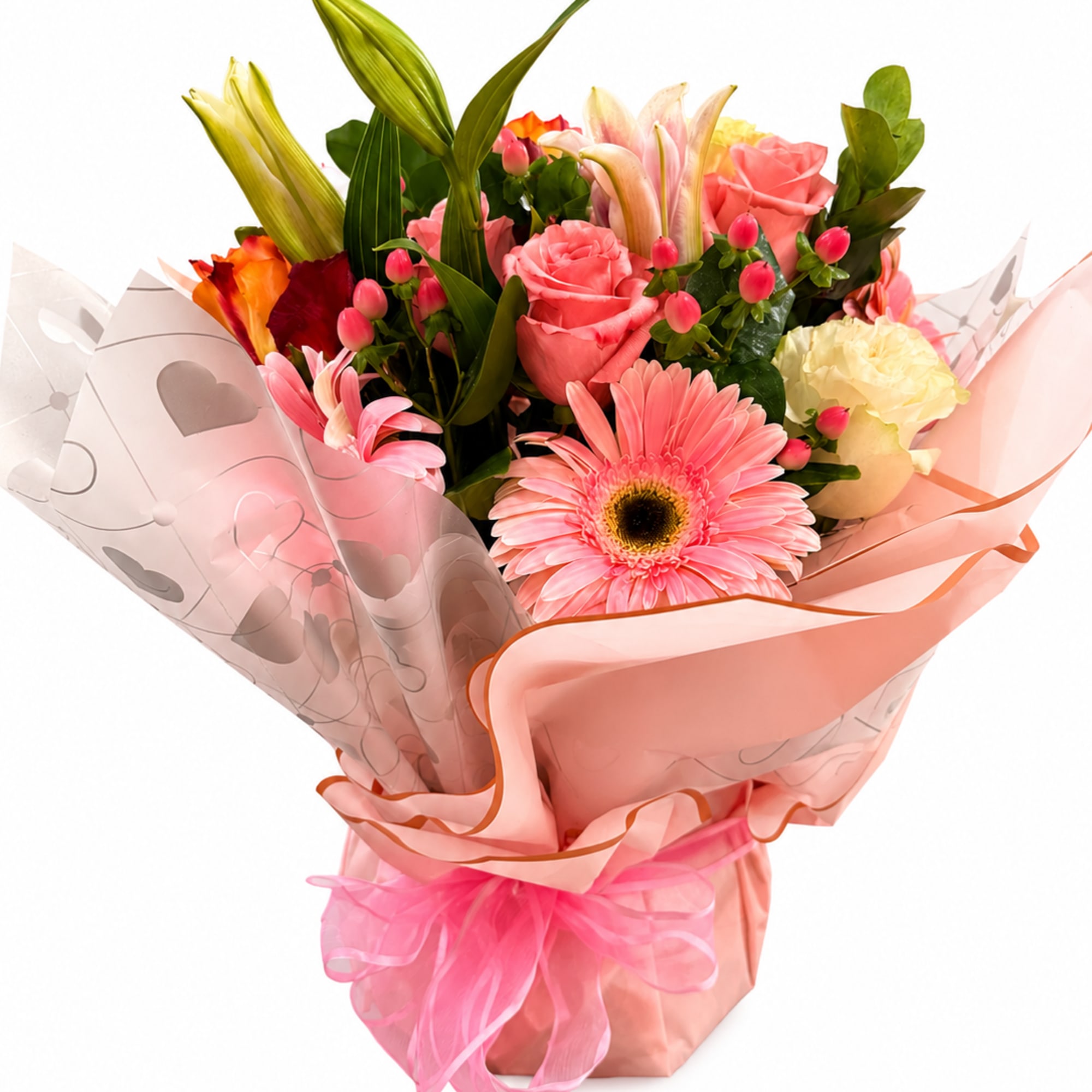 Pink and peach mixed bouquet with roses, lilies, and a gerbera daisy in pink wrap