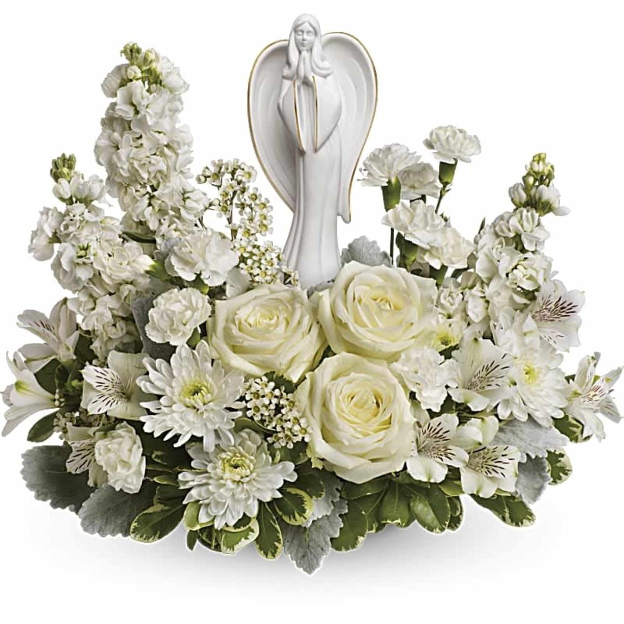 White floral arrangement with angel figurine centerpiece