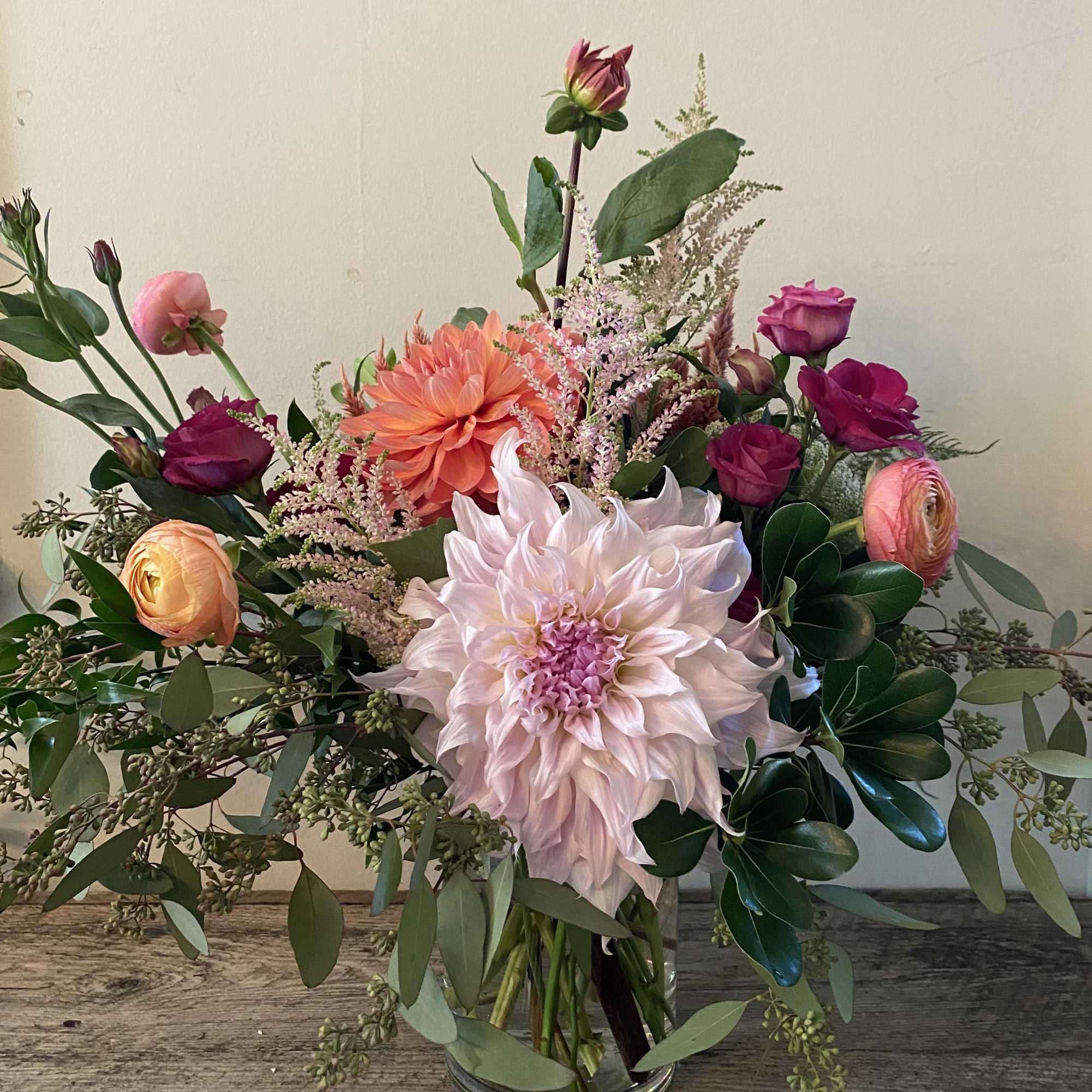 A whimsical assortment of seasonal blooms, unique fillers, and dried goods. A, photo 2 of 3