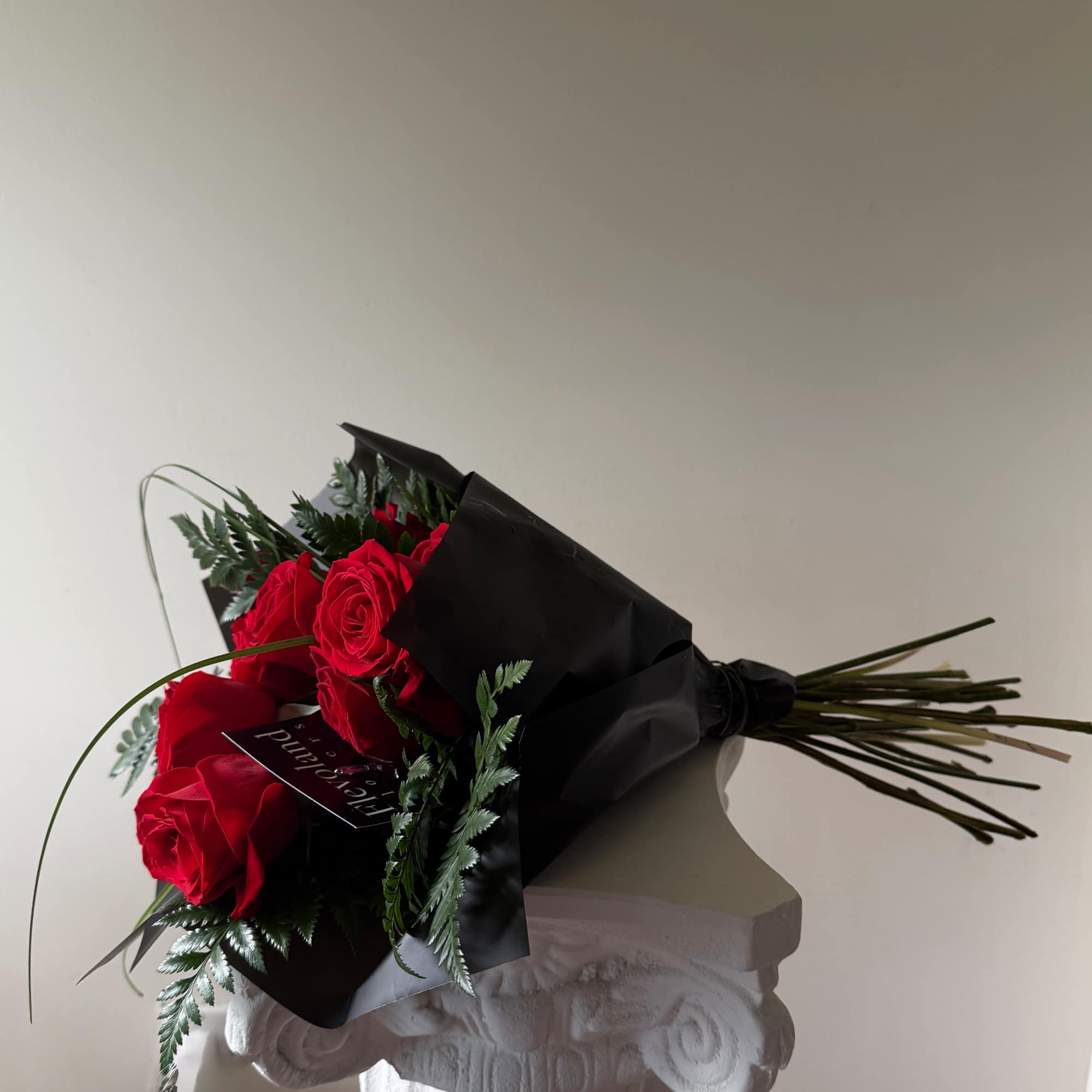 Premium Ecuadorian red roses, designed with a clean and refined finish.

Accented with