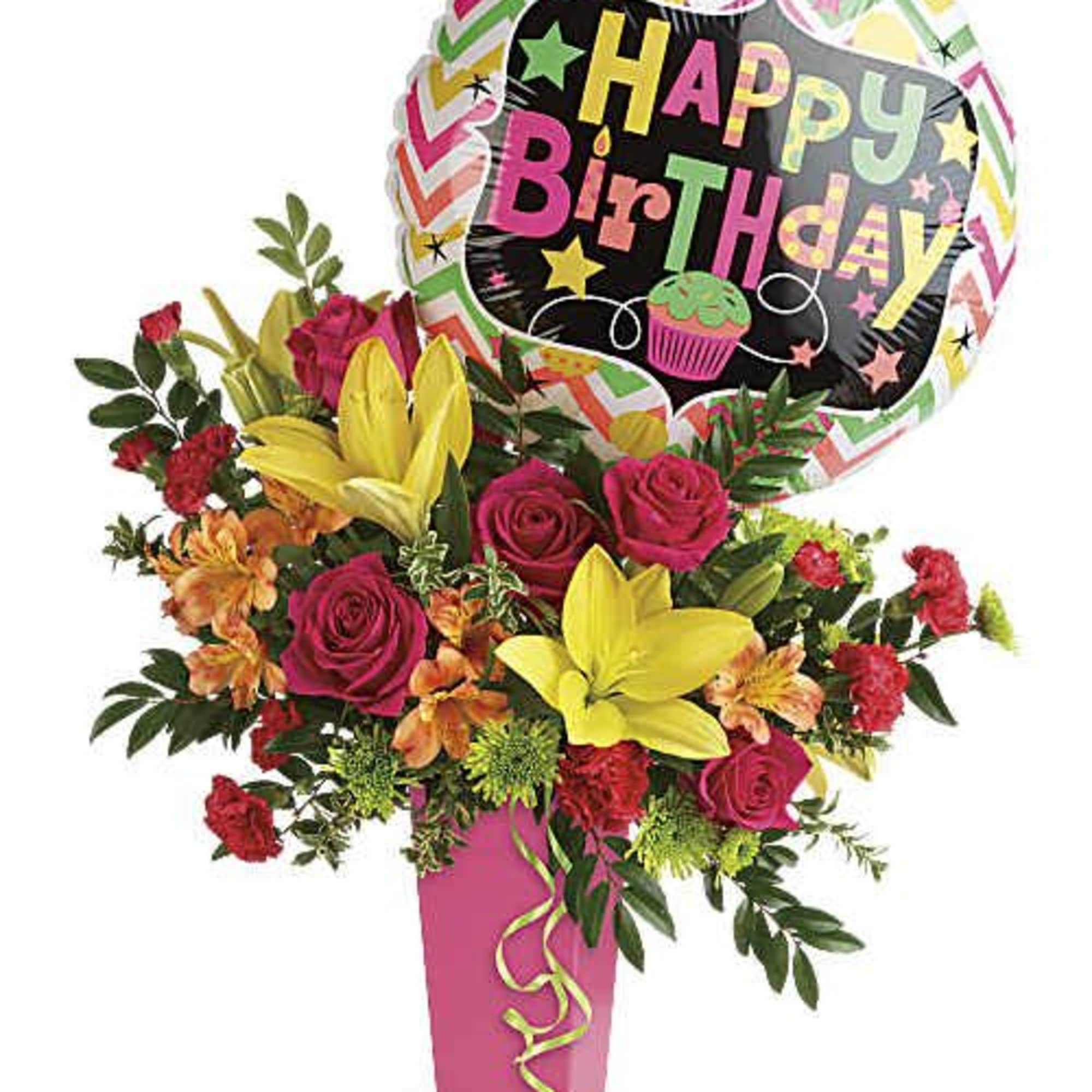 Birthday bouquet with roses, lilies, and a balloon in a pink vase