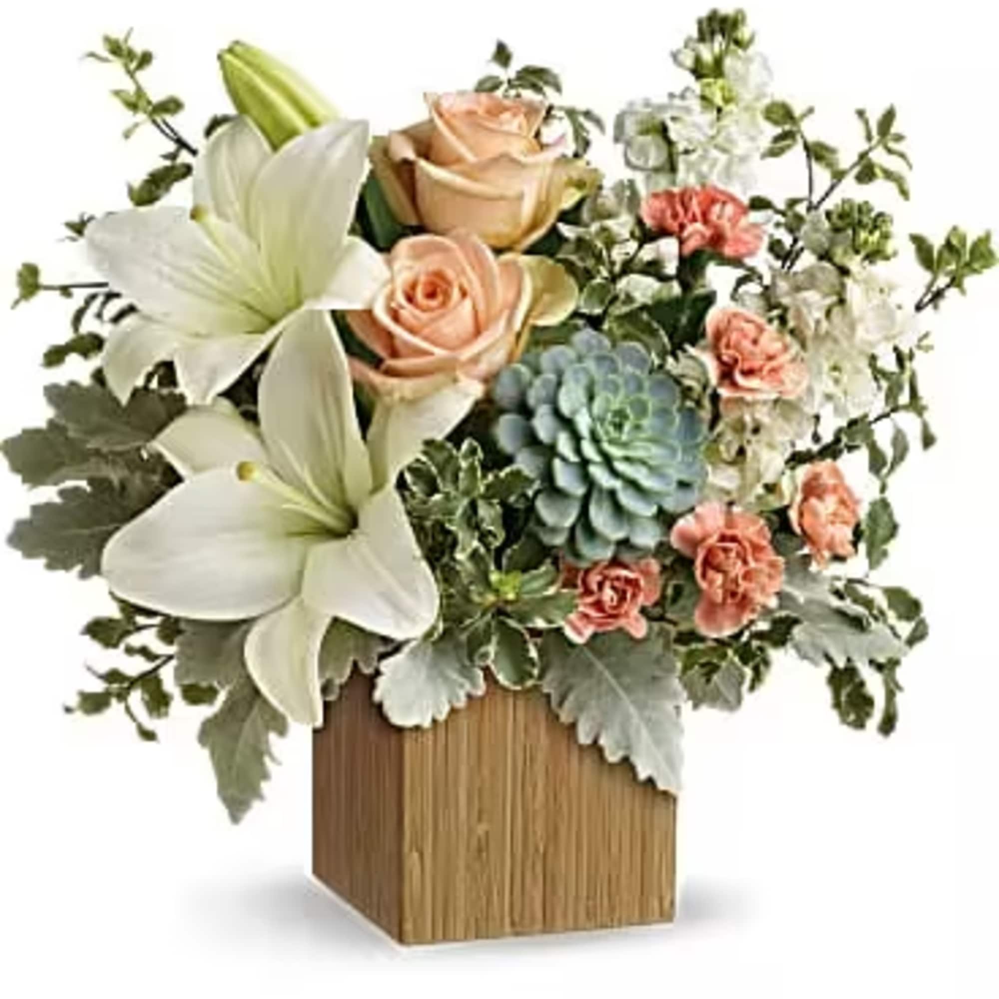 Flower arrangement with white lilies, peach roses, and a blue succulent in a wooden vase