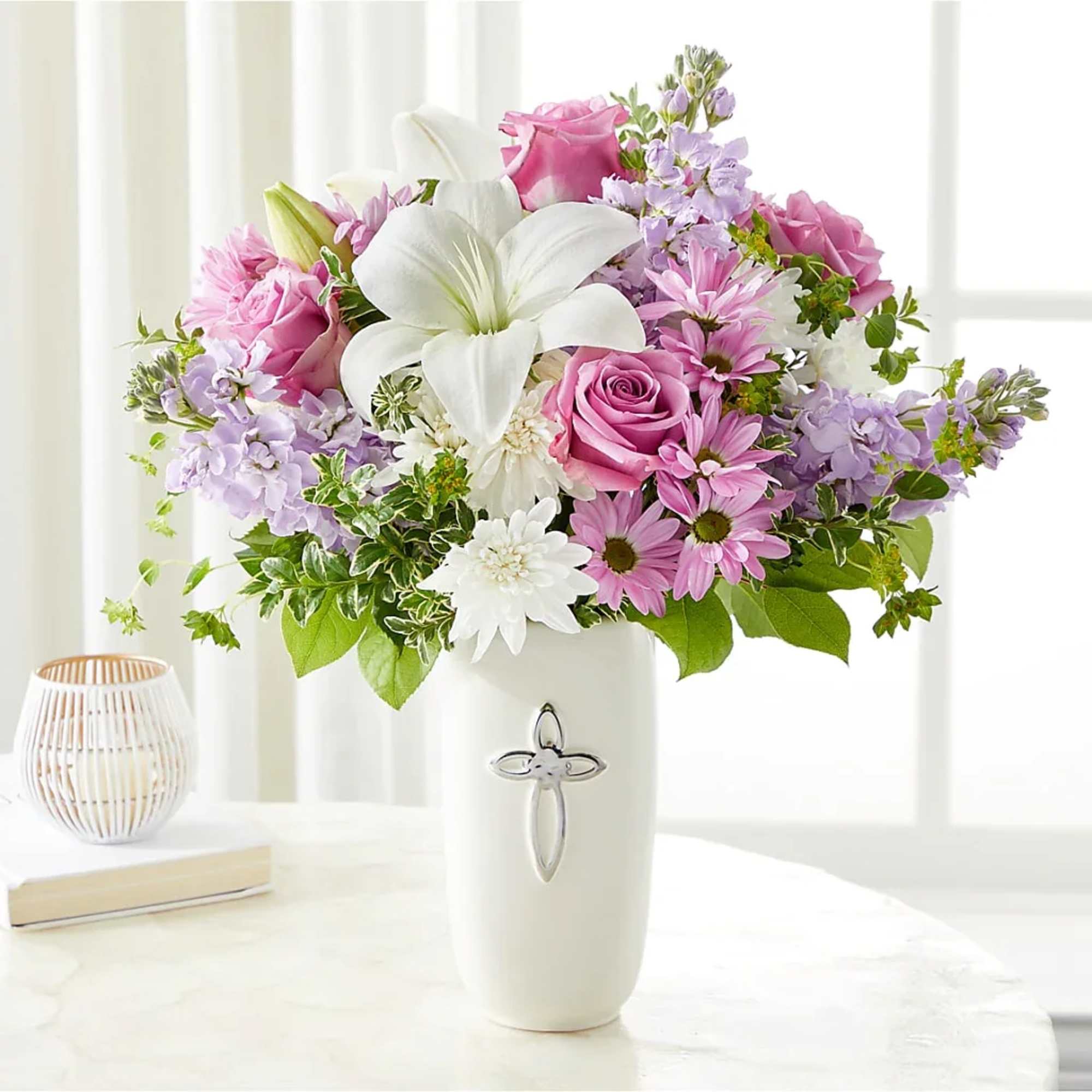 Pink and white mixed bouquet in a white vase