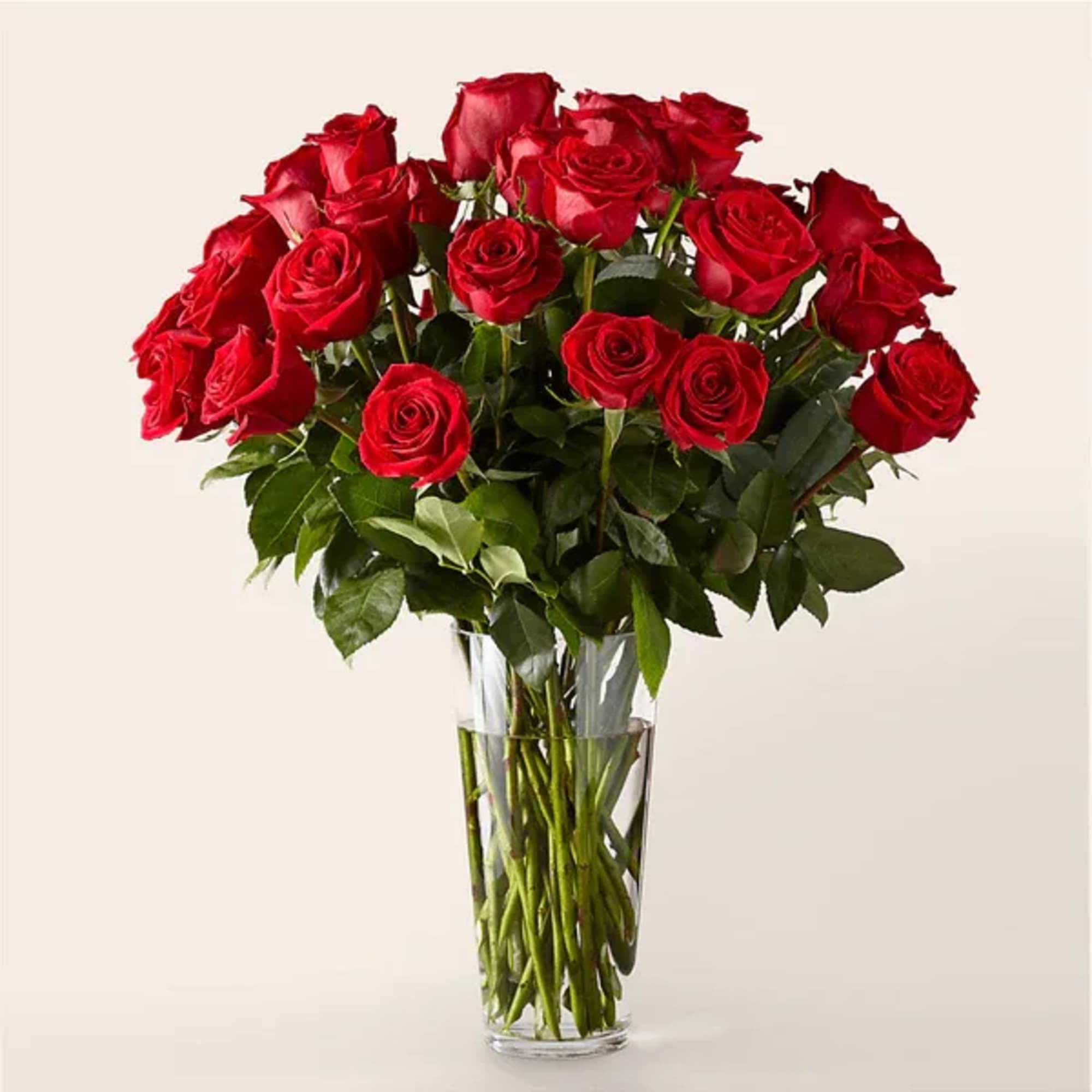 Bouquet of red roses in a clear glass vase
