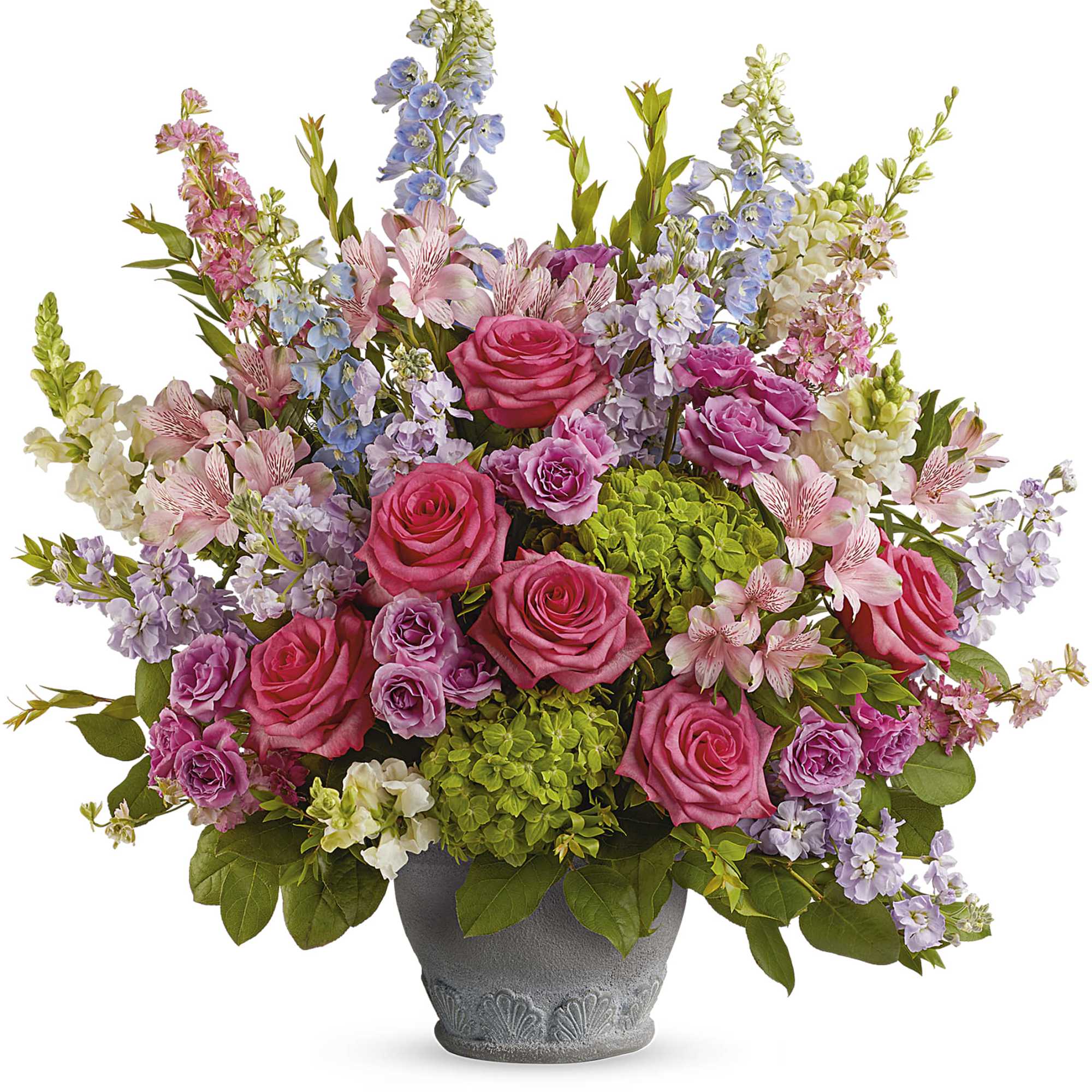 Mixed pink and lavender flowers in a gray pot