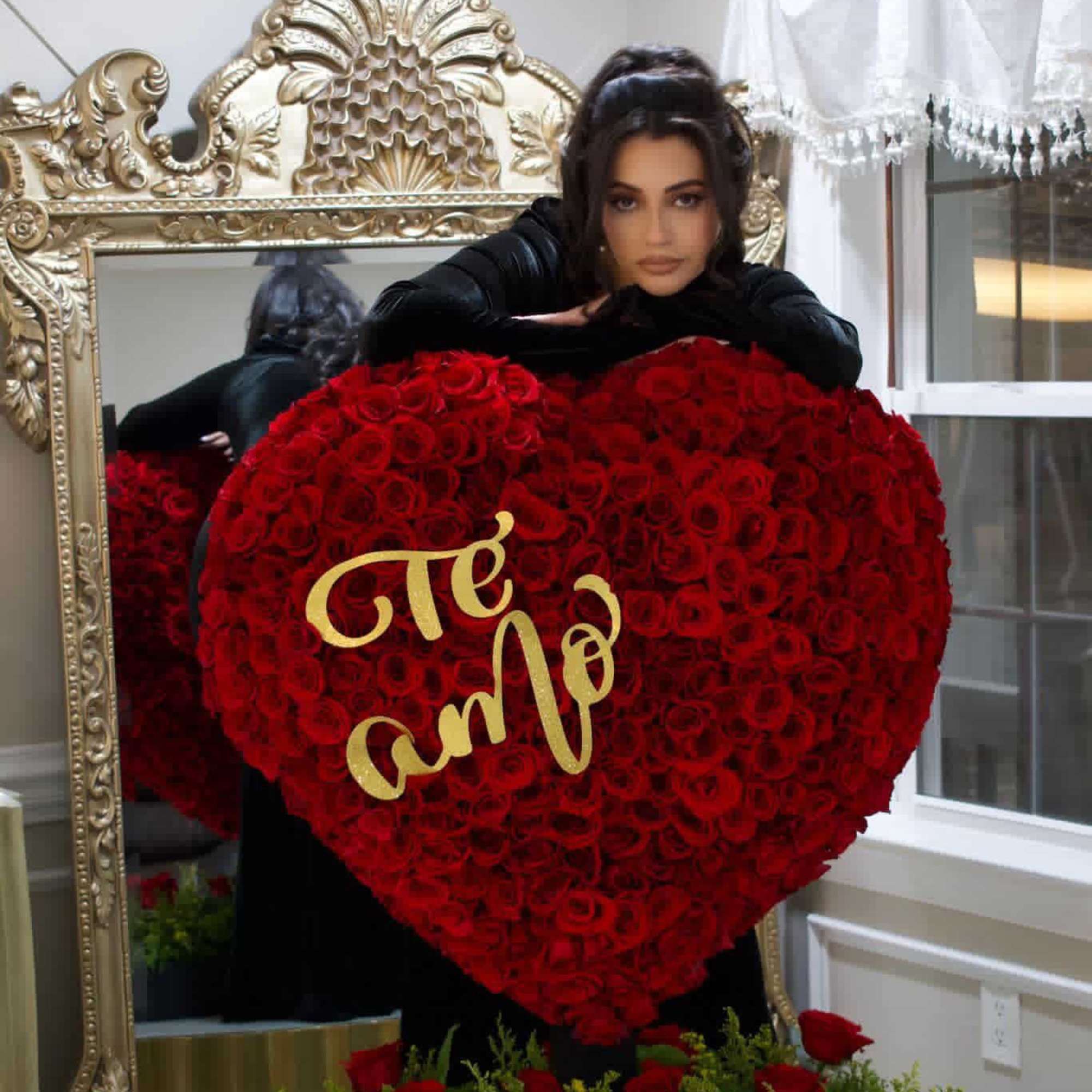 Heart-shaped red rose arrangement with gold lettering and a small rose box below