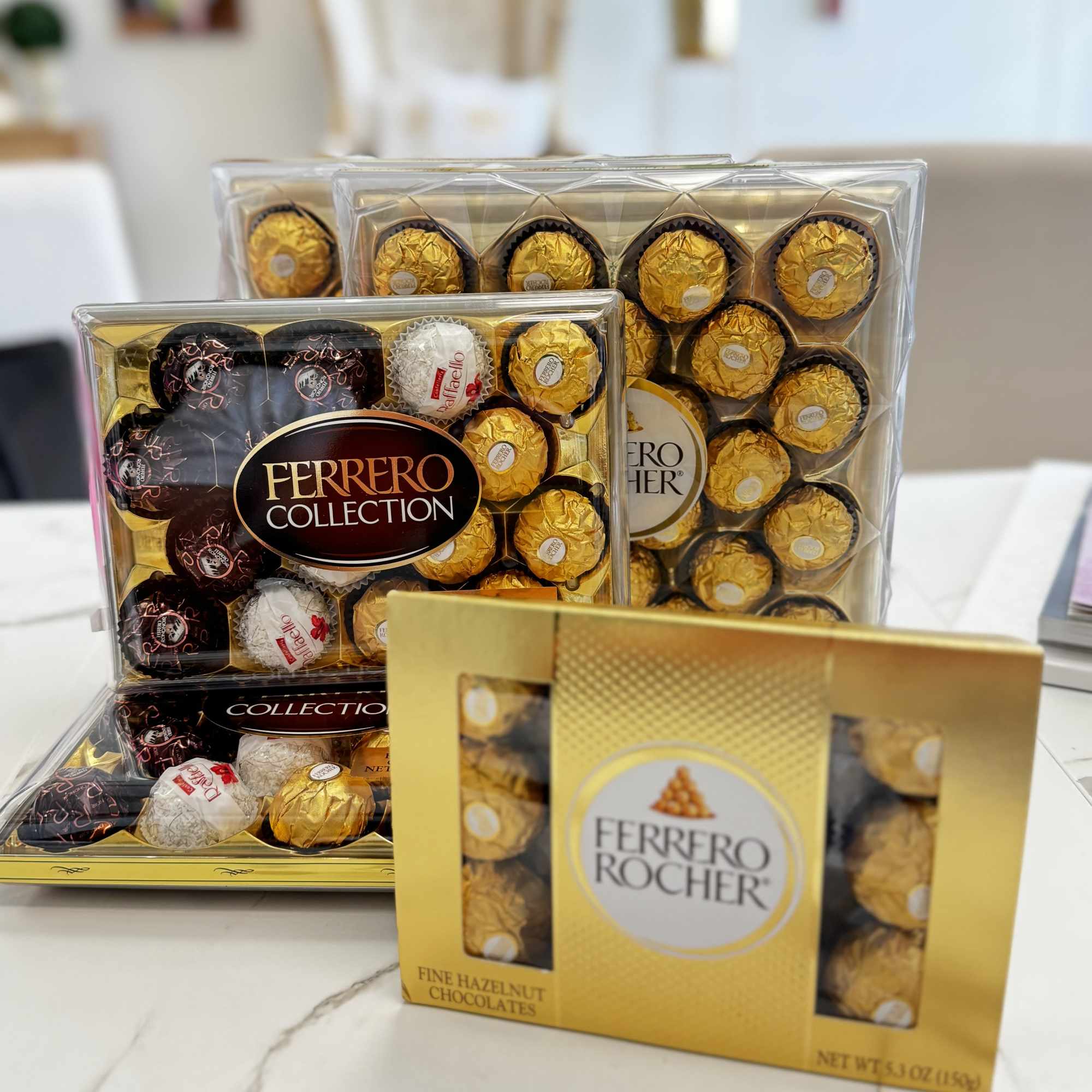 Boxes of Ferrero Rocher chocolates on a table