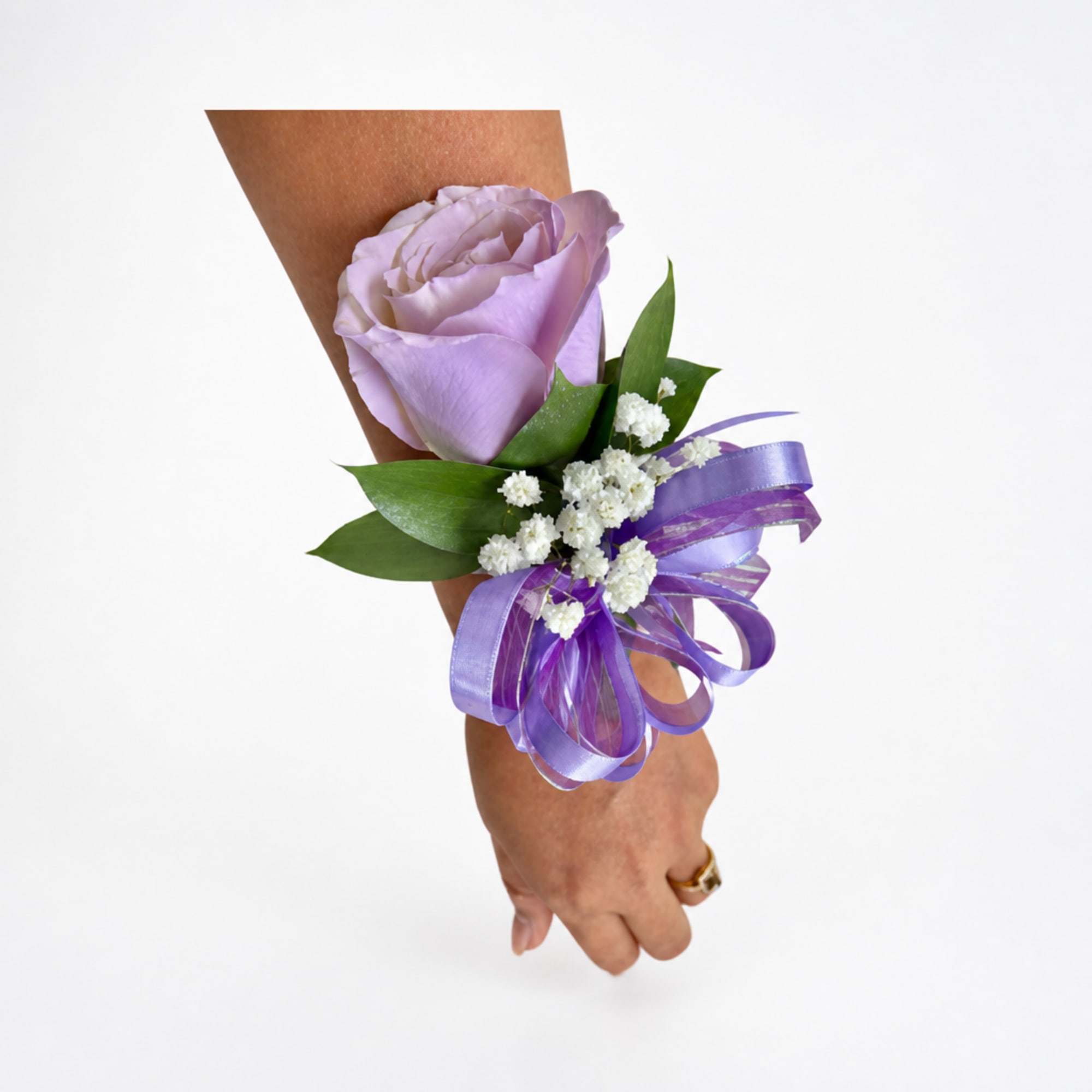 Lavender rose wrist corsage with purple ribbon and white filler flowers, photo 3 of 3