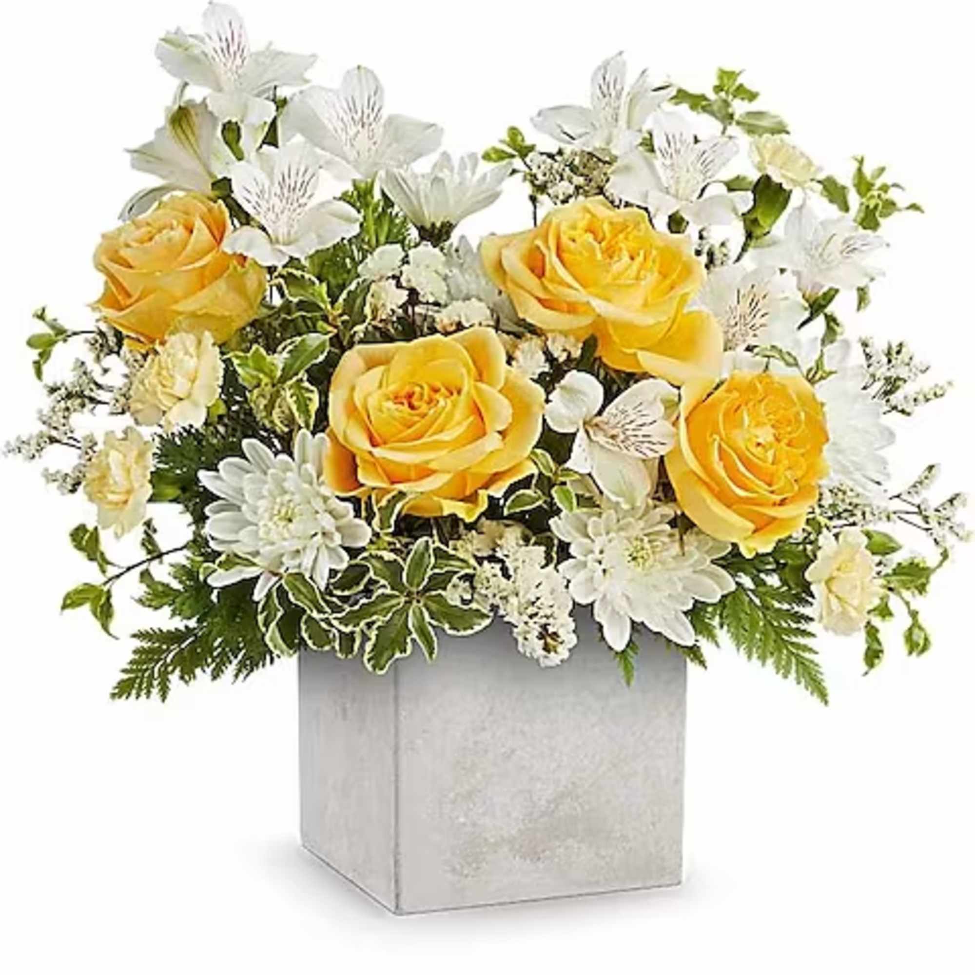 Yellow roses and white flowers in a silver square vase