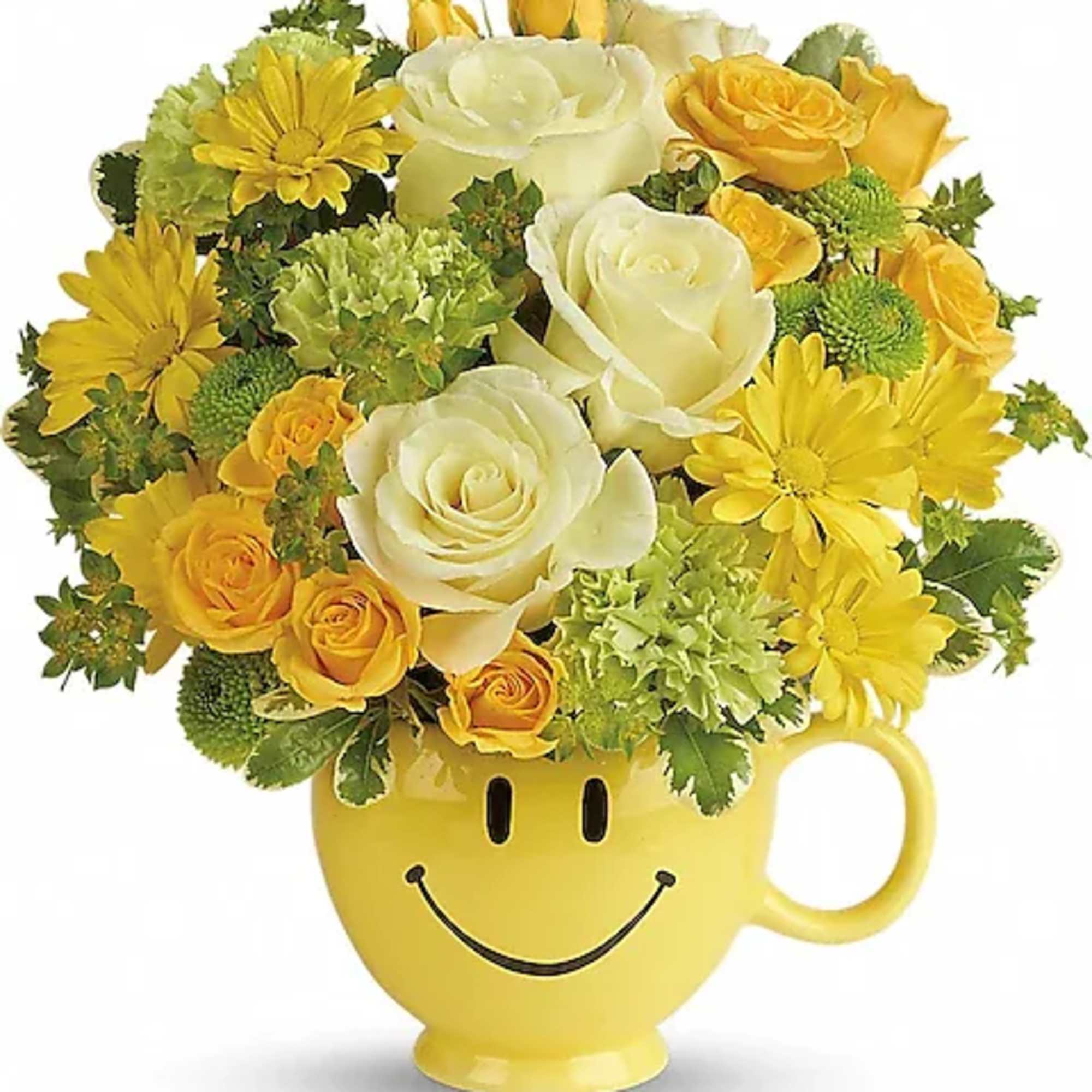 Yellow and white flower arrangement in a smiley-face mug