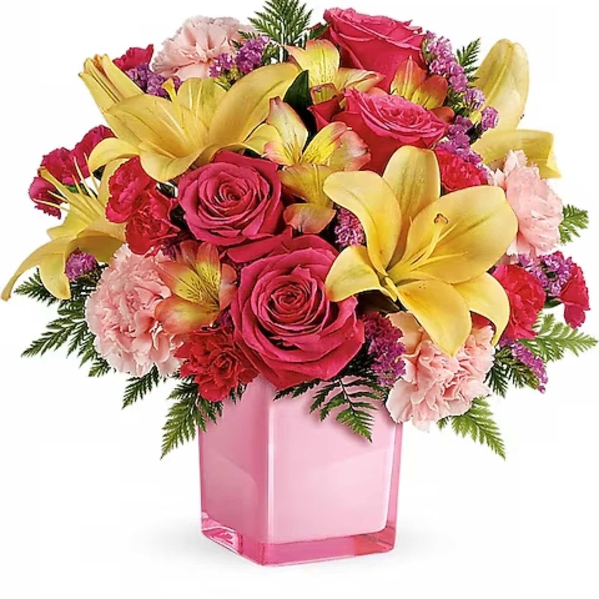 Bouquet of pink roses, yellow lilies, and carnations in a pink vase