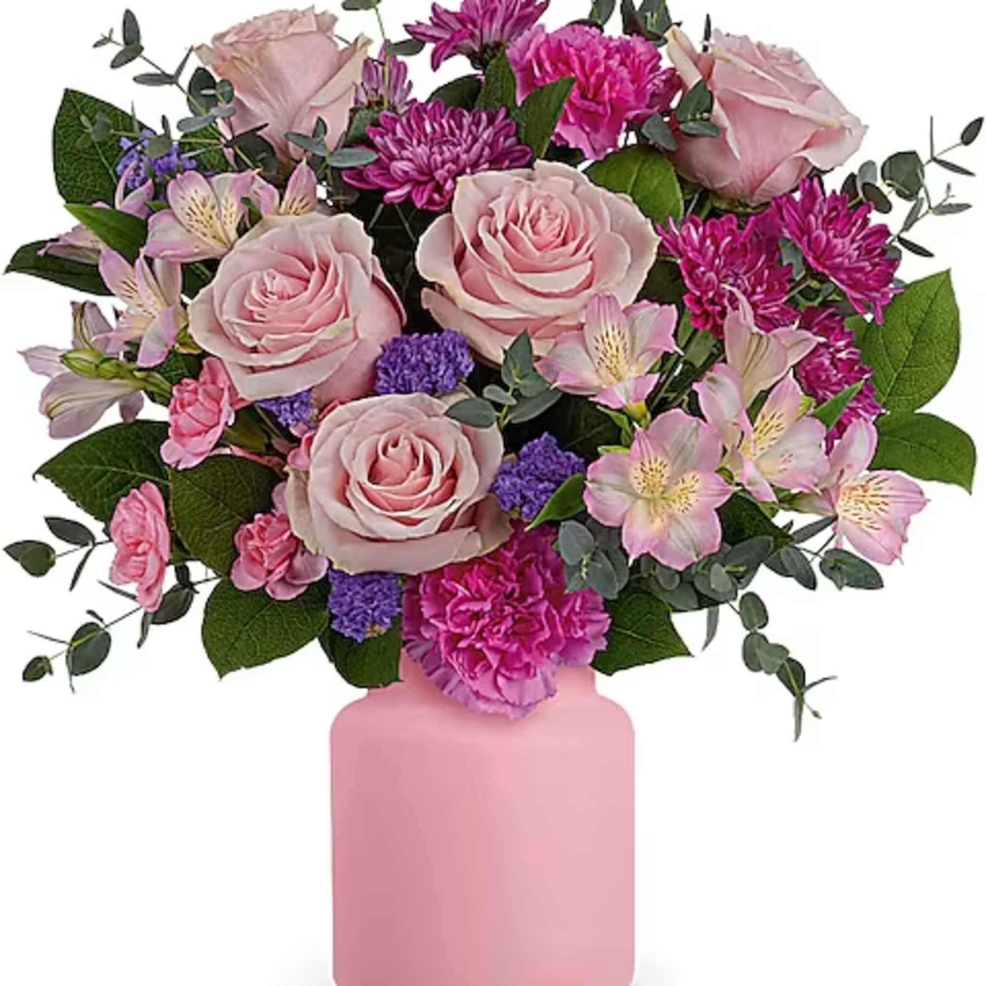 Pink roses and purple flowers arranged in a pink vase