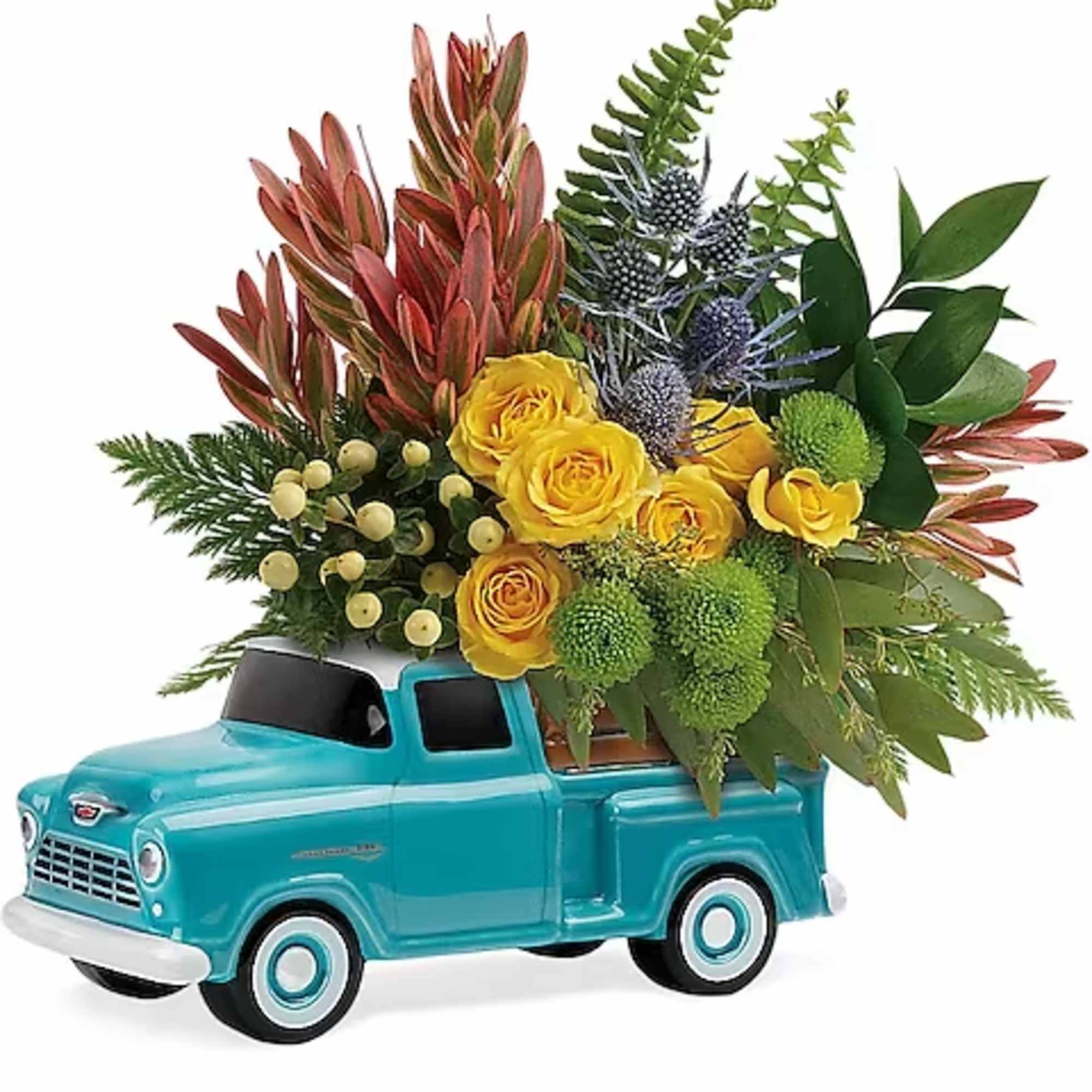 Yellow roses arranged in a turquoise toy truck