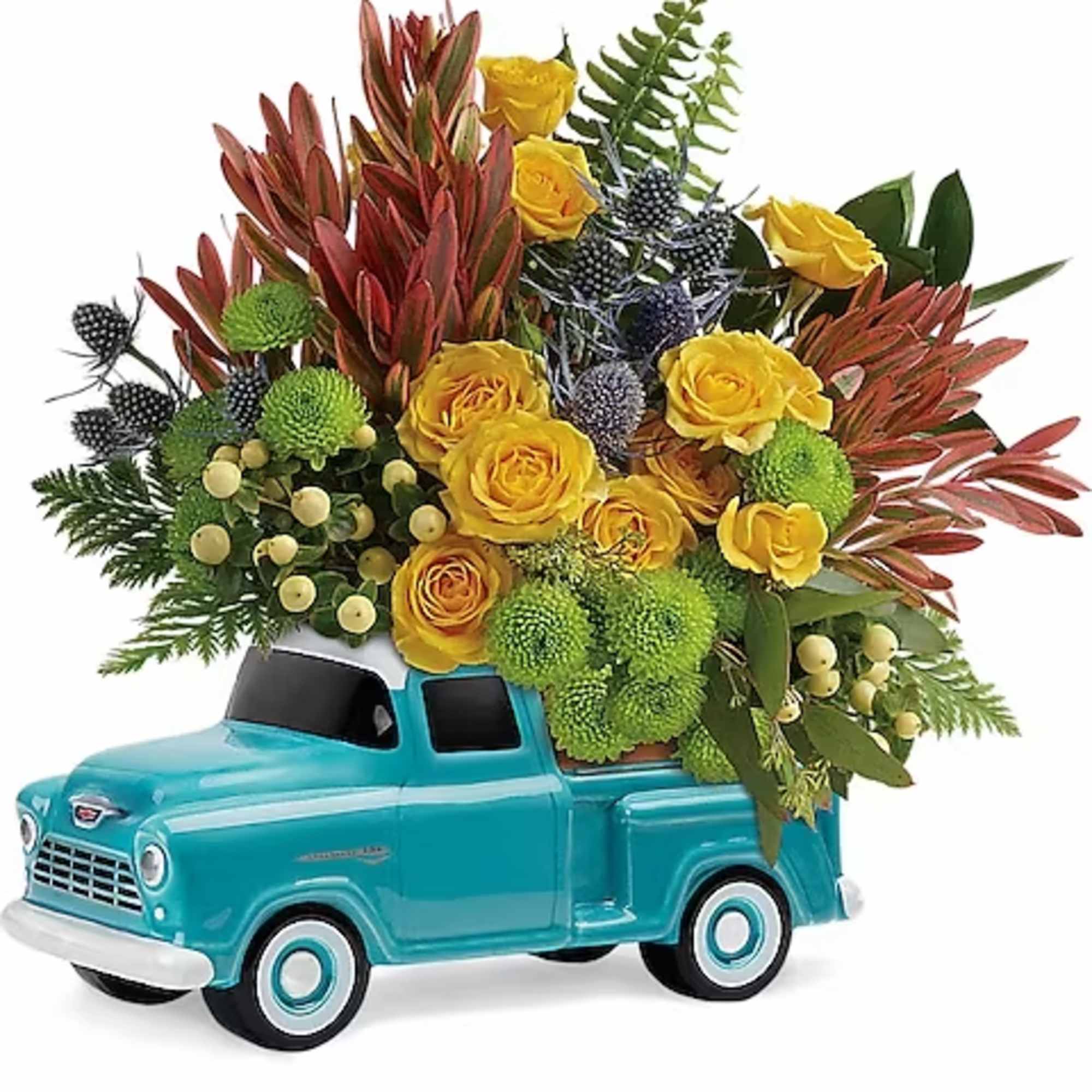 Yellow roses arranged in a turquoise toy truck