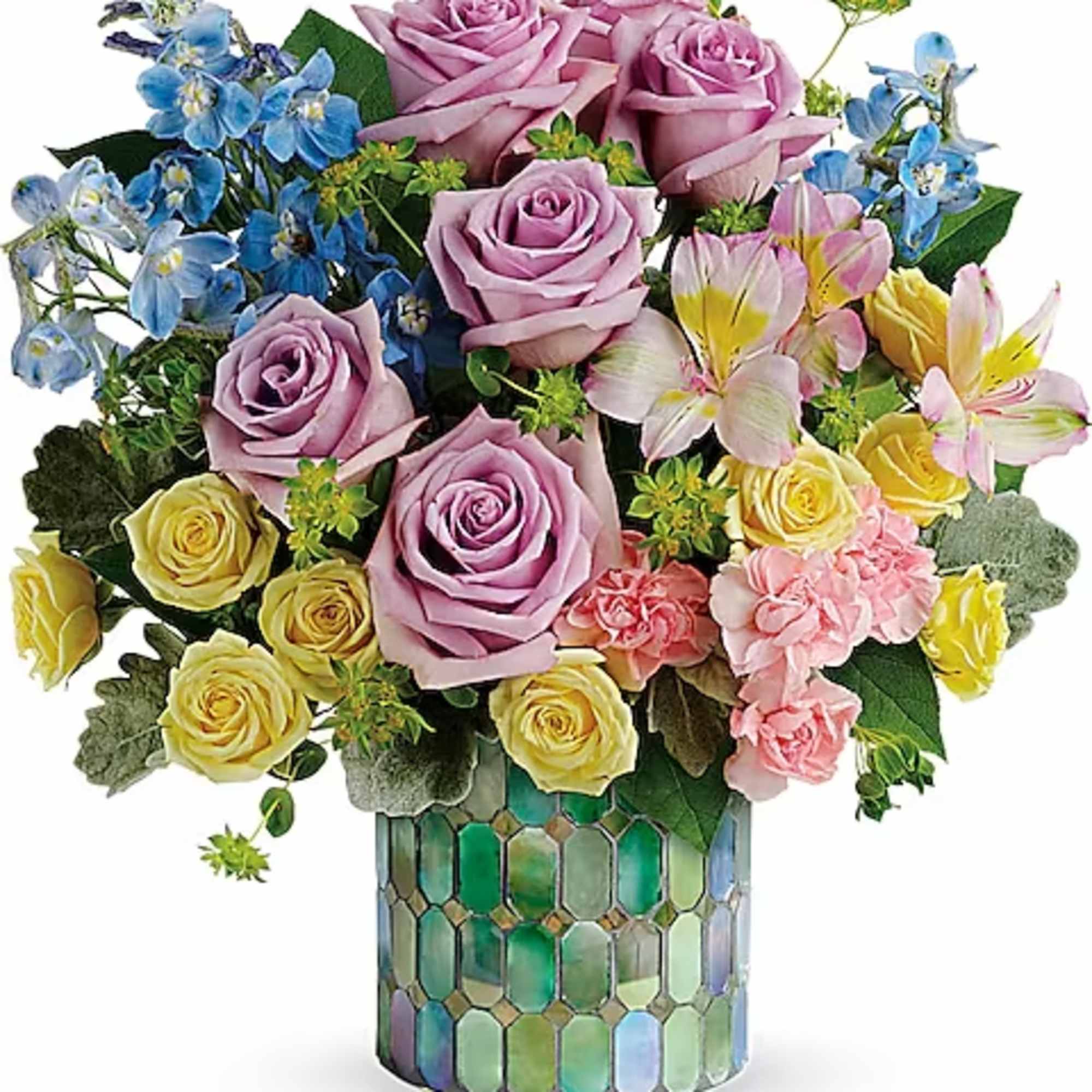Bouquet of pink roses, yellow roses, blue flowers, and lilies in a mosaic vase