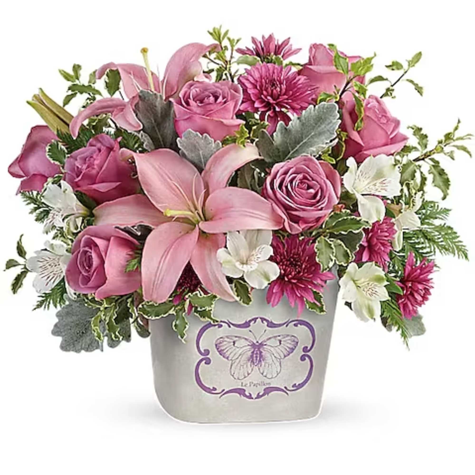 Pink roses and lilies arranged in a decorative pot