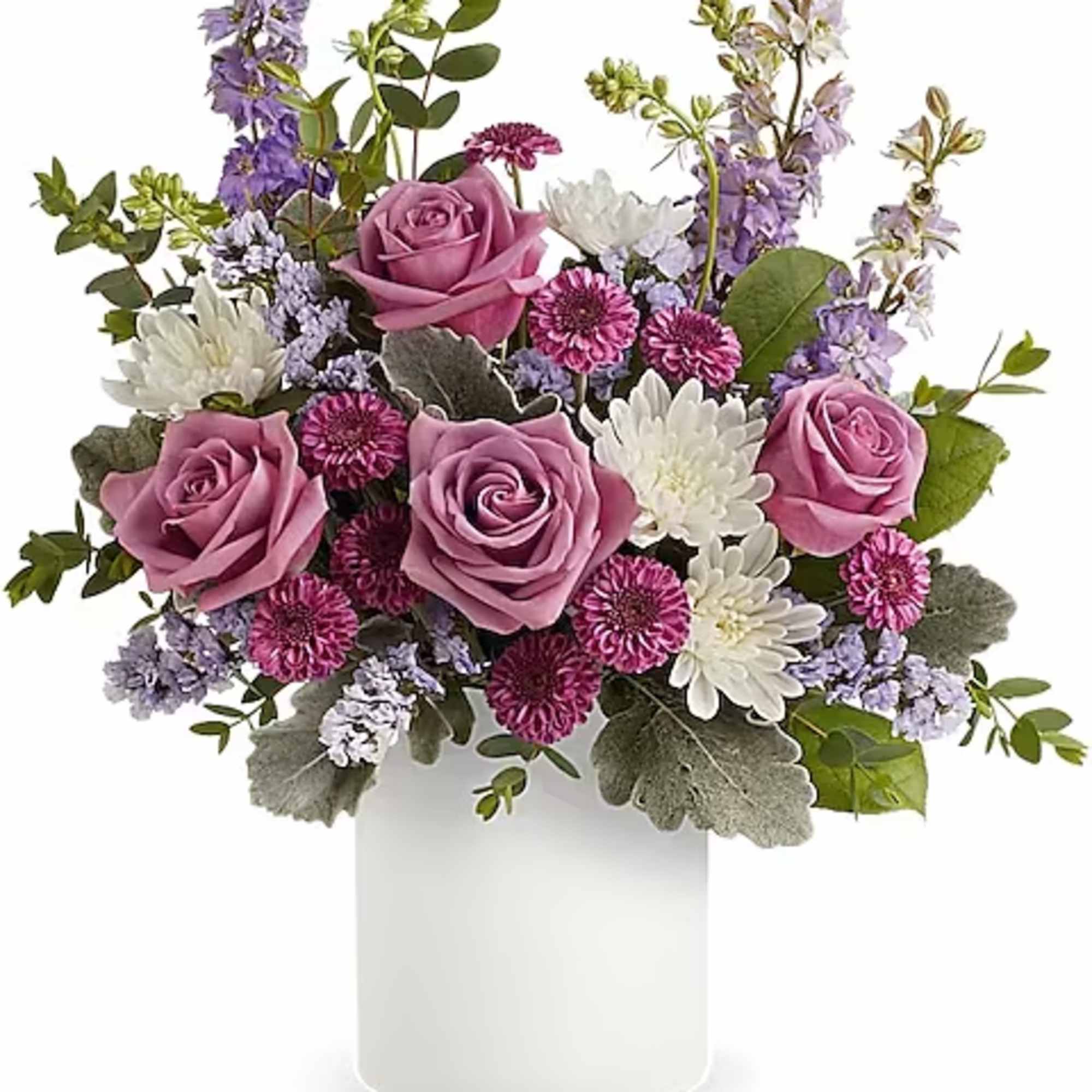 Pink roses and white daisies in a white vase